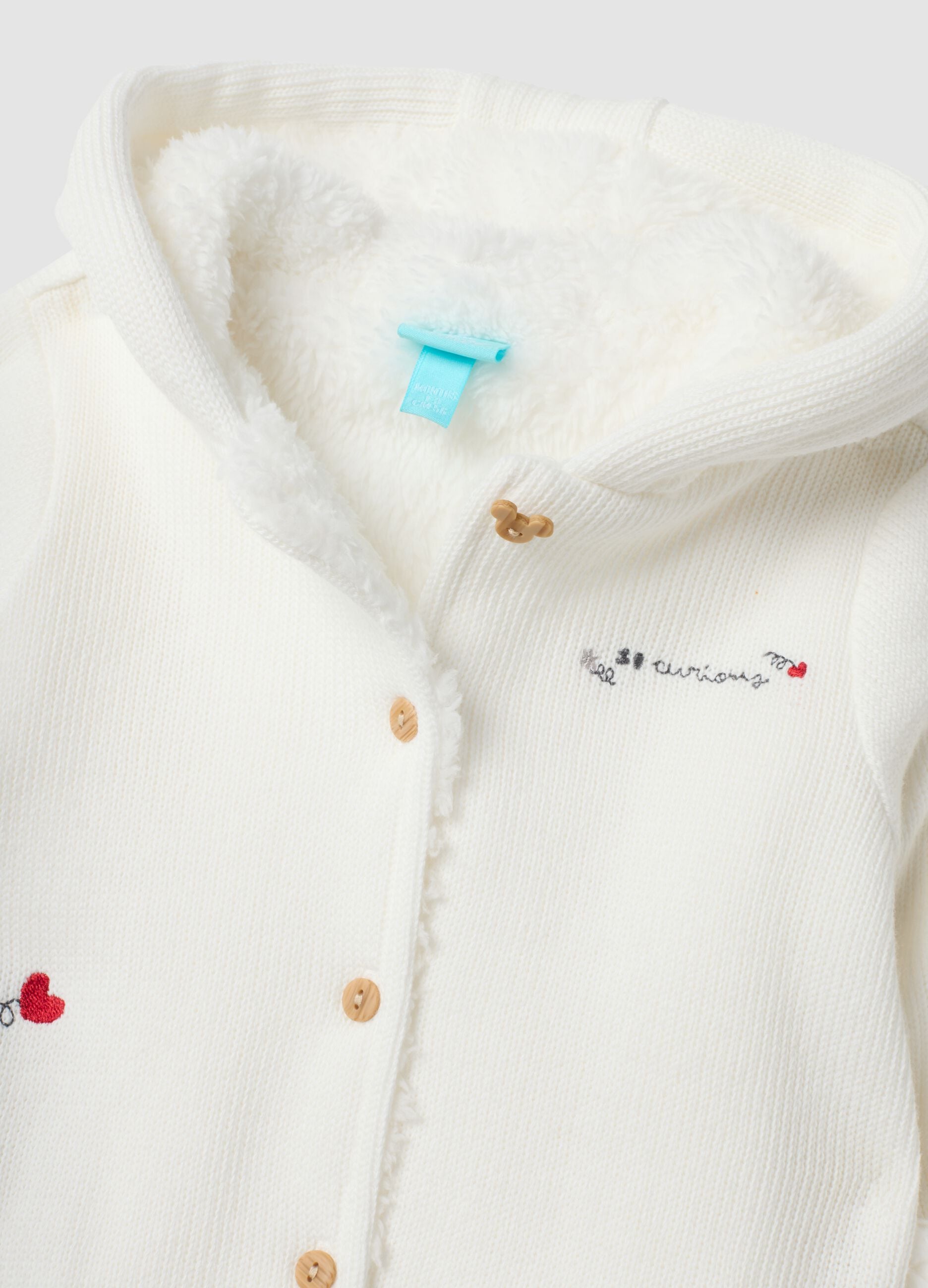 White hooded cotton-blend baby sleepsuit with Minnie print