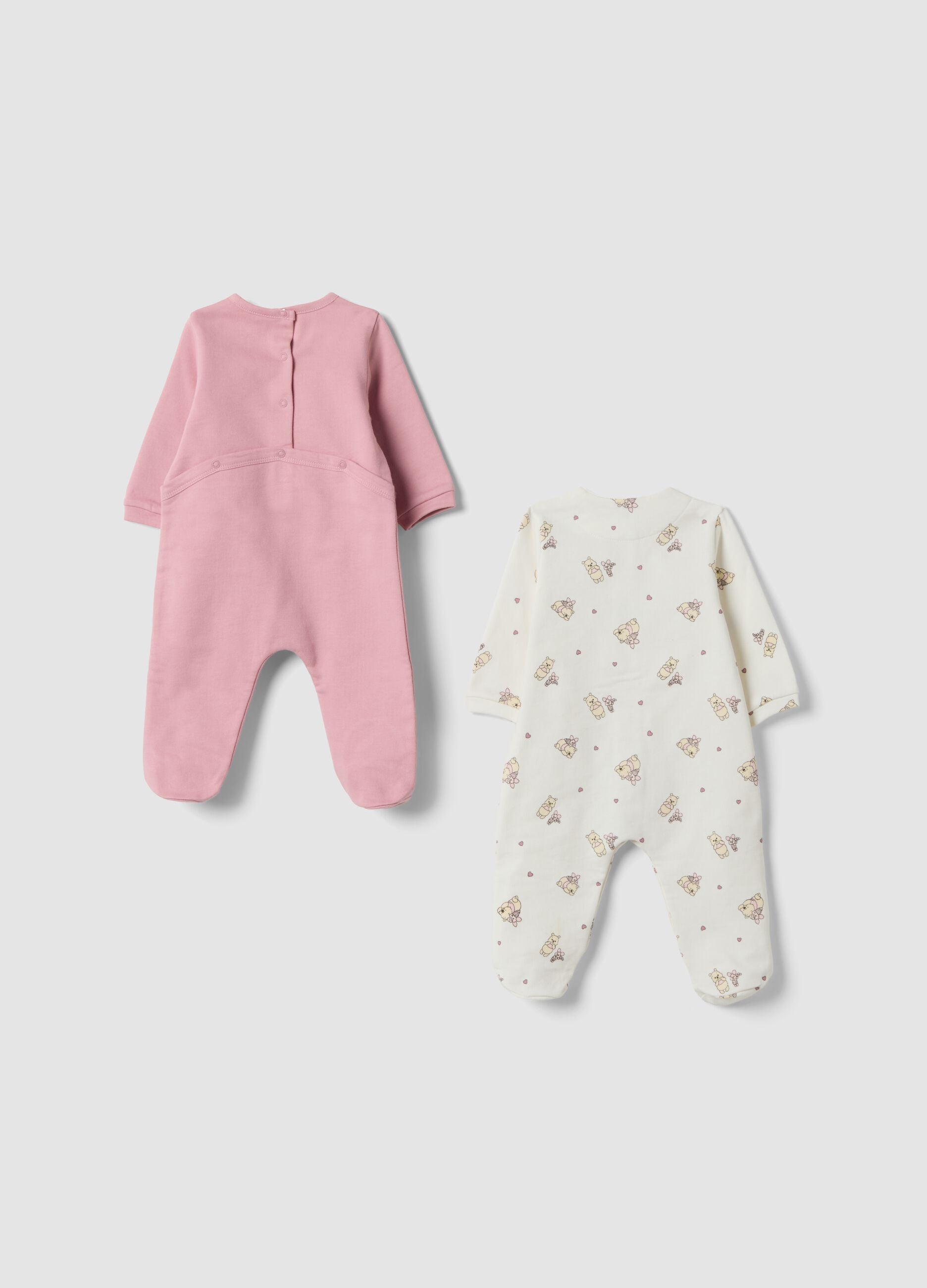 2-pack organic cotton baby sleepsuits with feet and Winnie the Pooh print