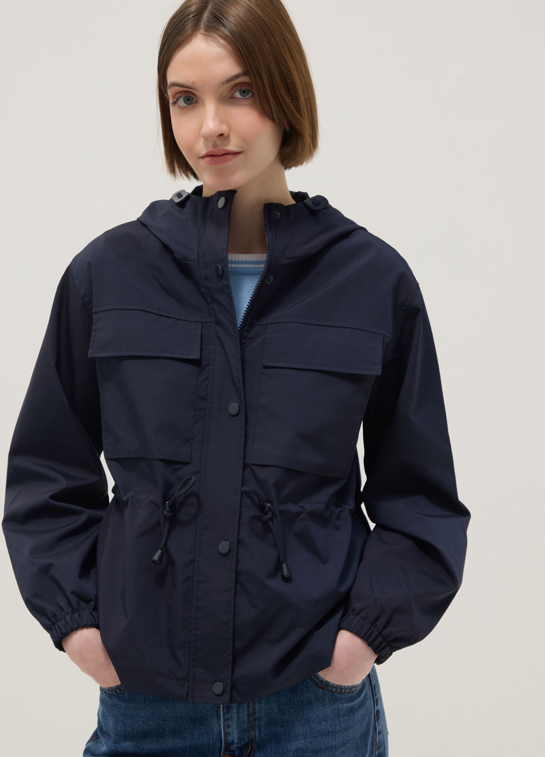 Blue waterproof jacket regular fit with pockets and hood