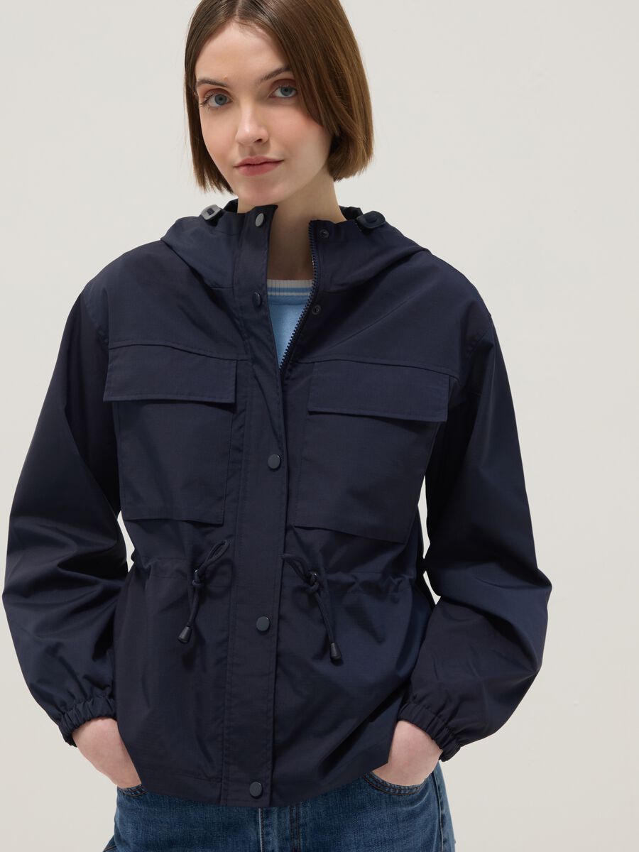 Blue waterproof jacket regular fit with pockets and hood_1
