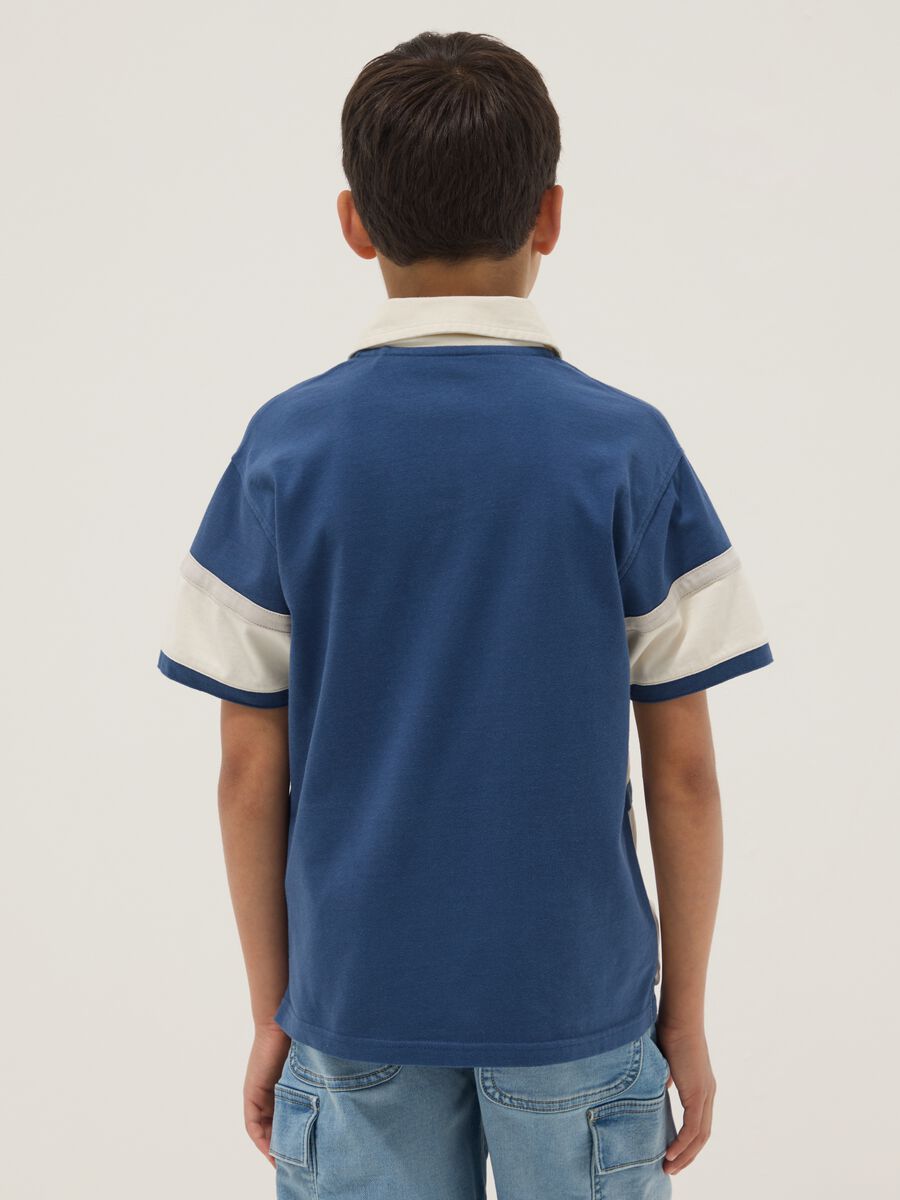 Polo blu in puro cotone a maniche corte_1