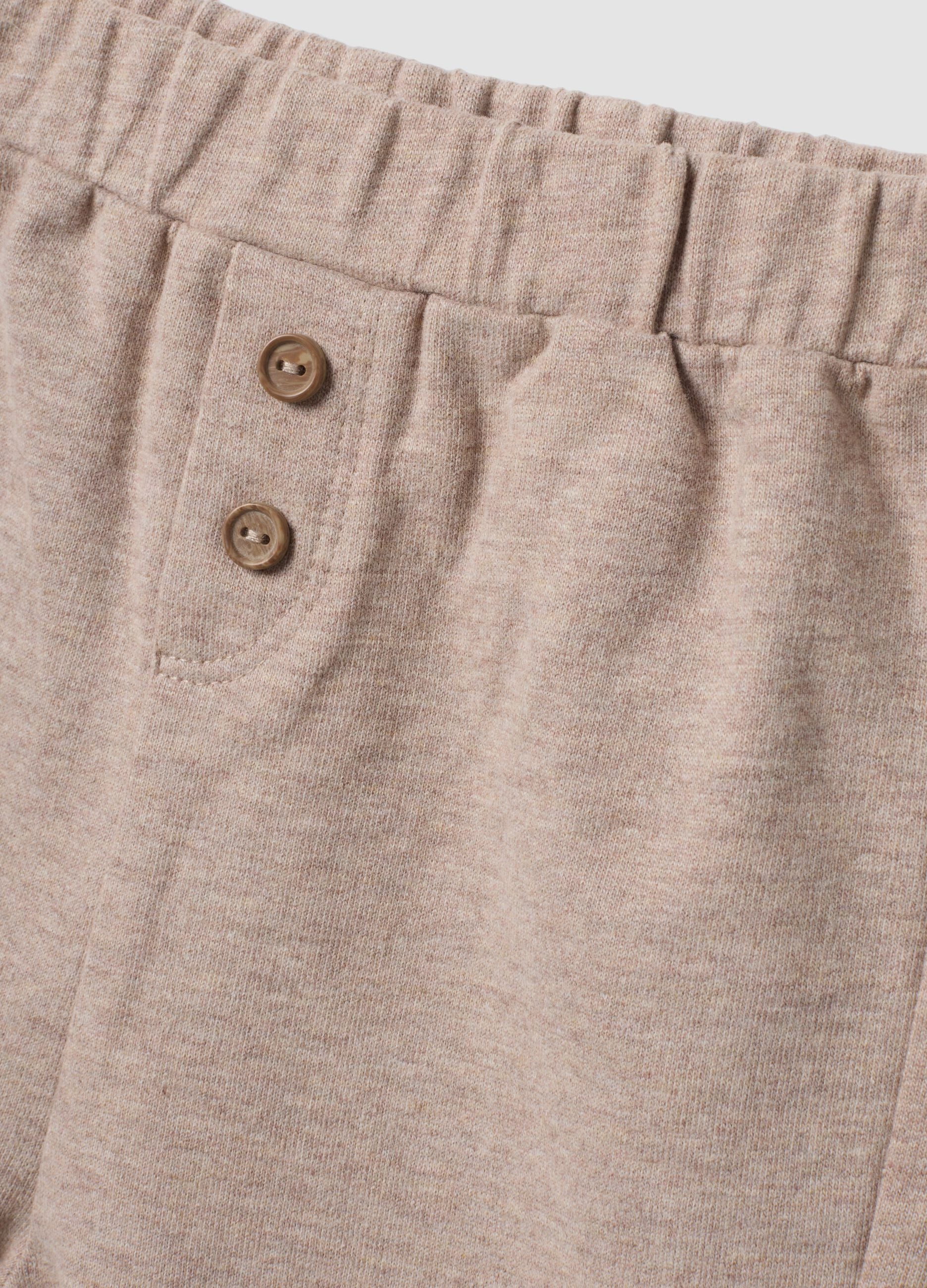 Beige organic cotton baby trousers with elasticated waist