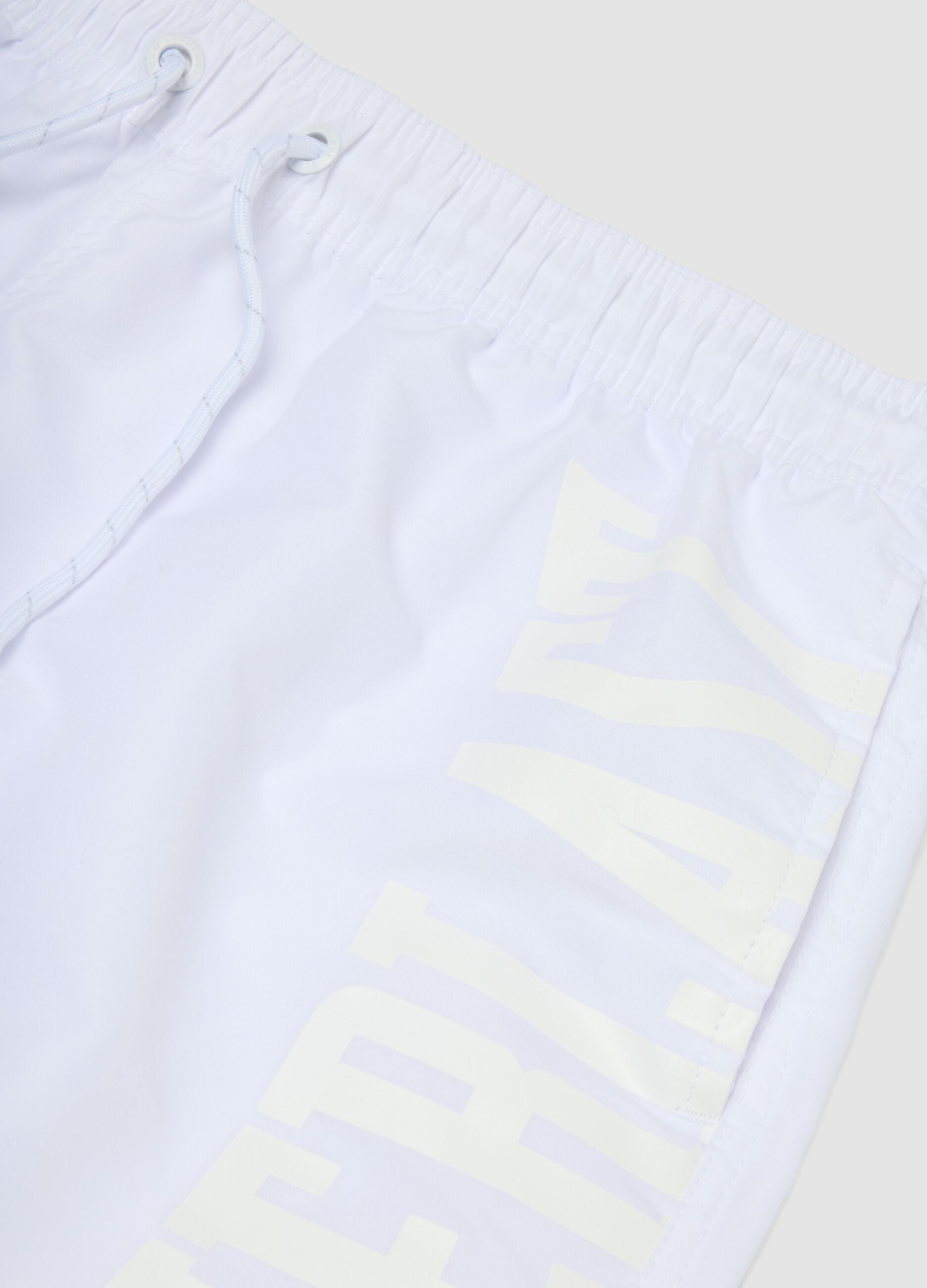 White swim shorts with drawstring