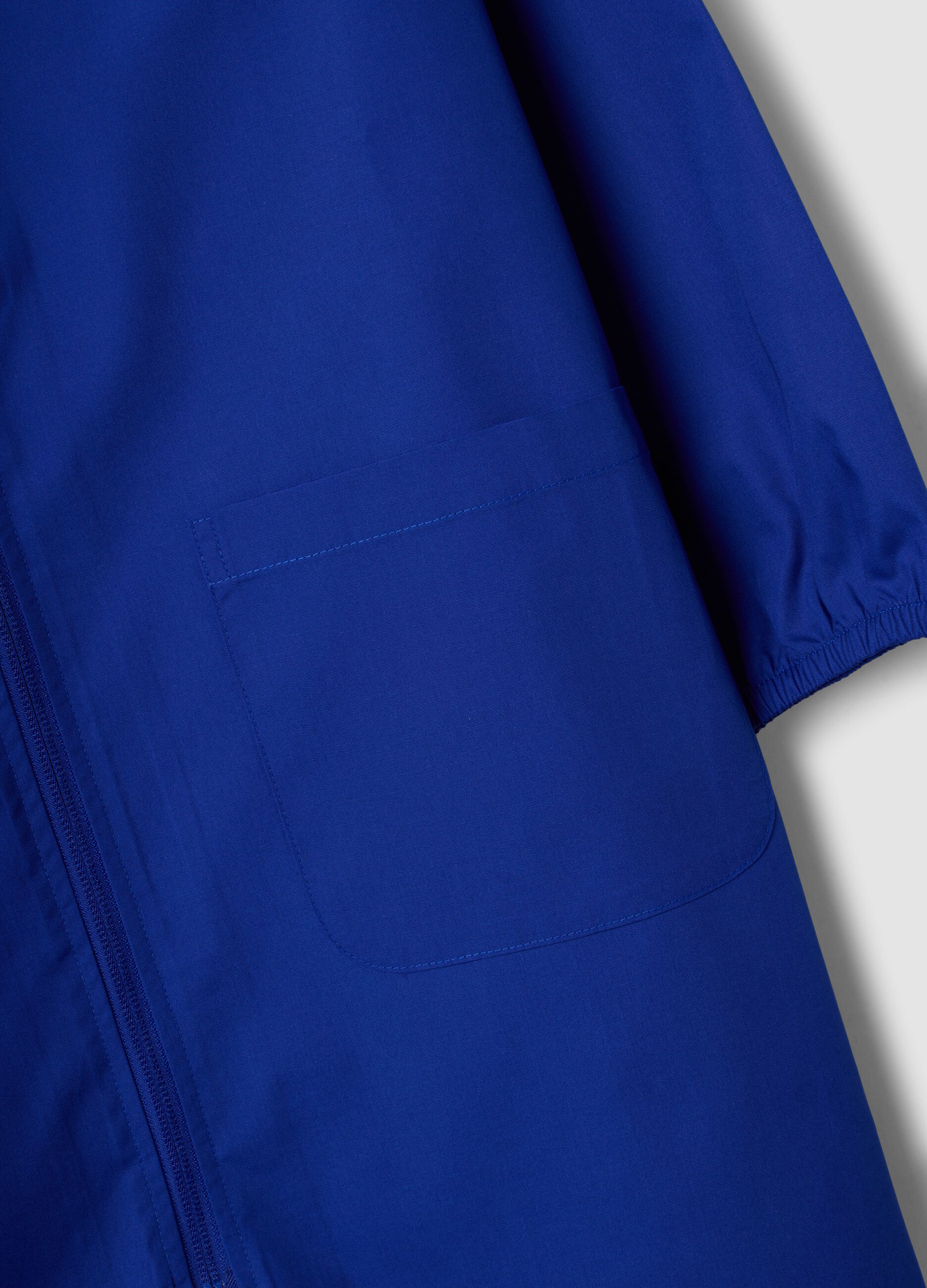 Blue school apron with zip, white collar and Stitch embroidery