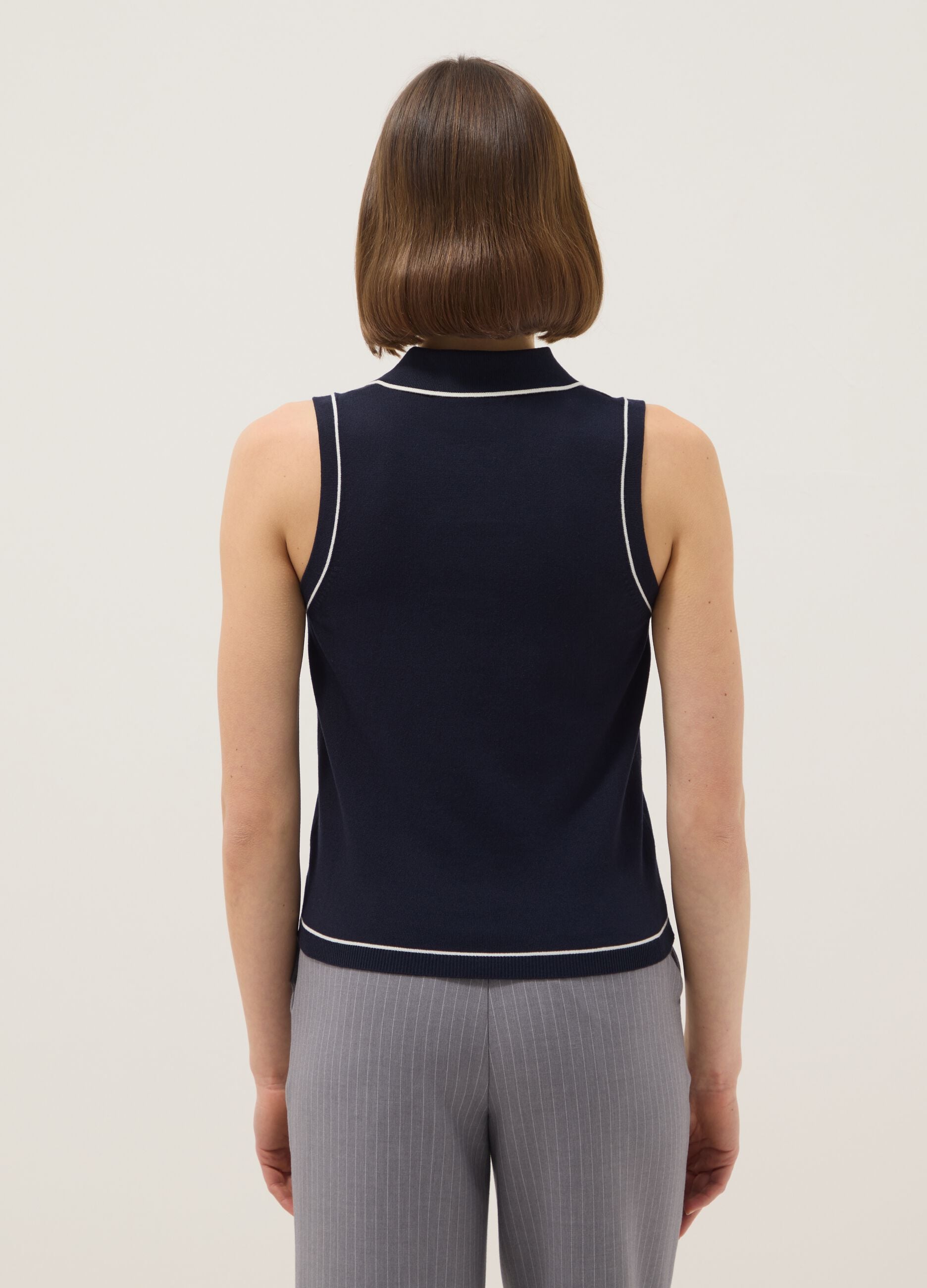 Sleeveless blue viscose blend slim fit polo with buttons