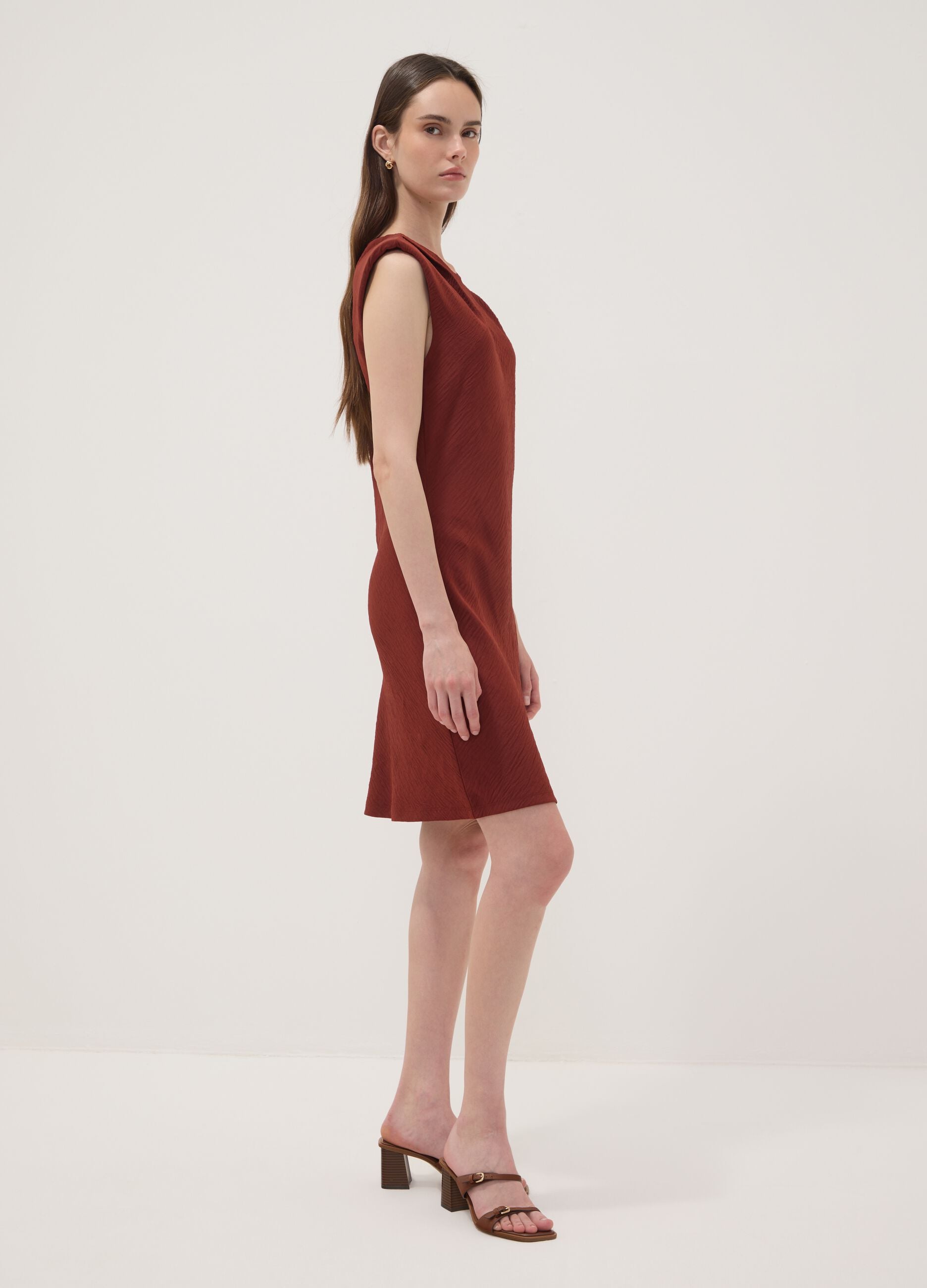 Red fitted dress with ruched detailing