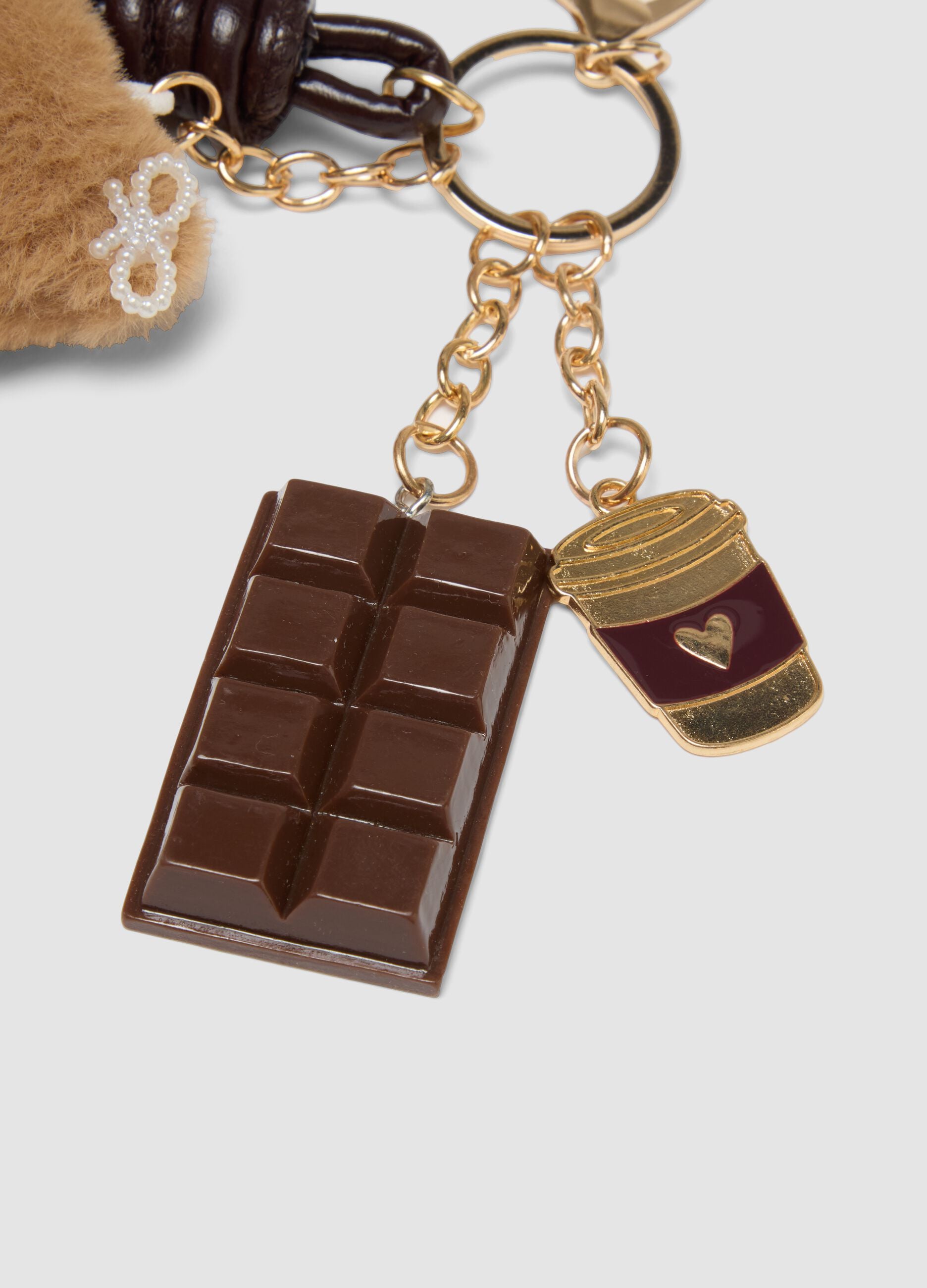 Brown keyring with teddy bear and charms