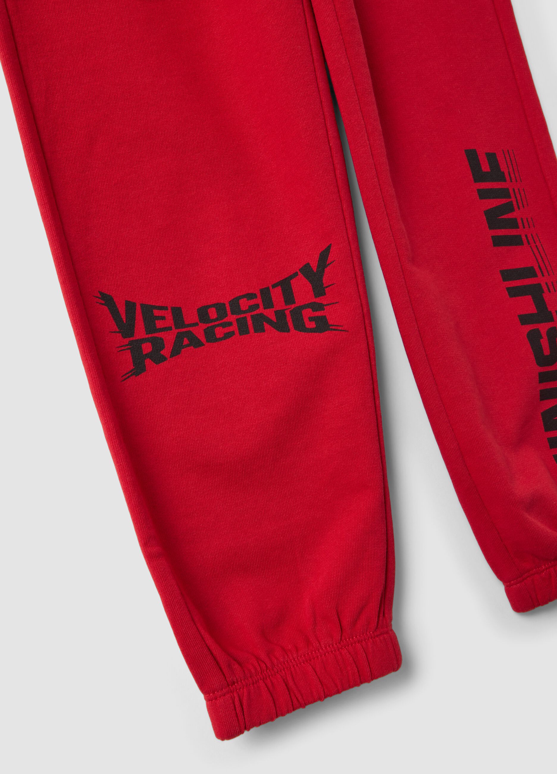 Red pure cotton jogger trousers with racing print