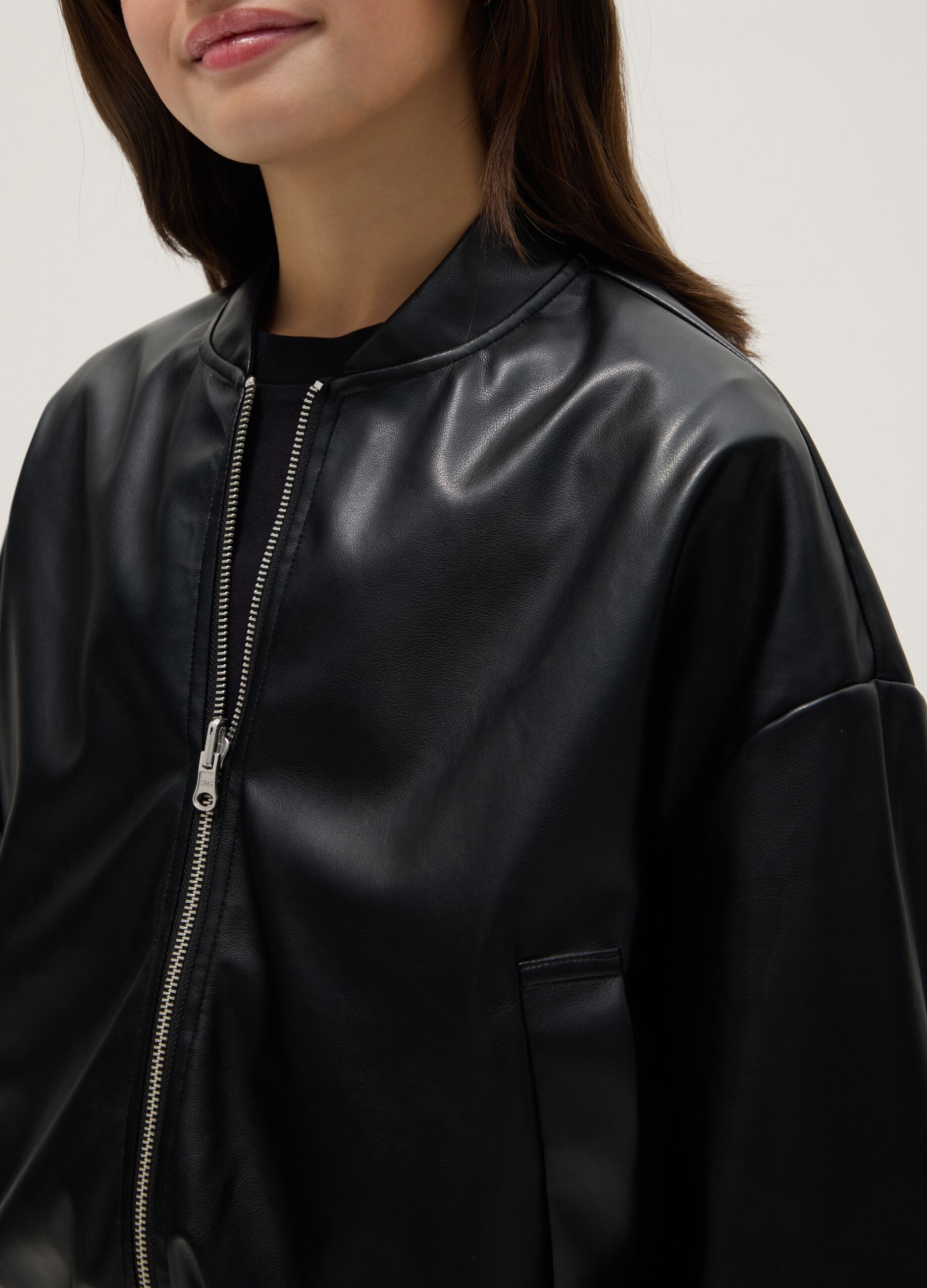 Girls' black bomber jacket with oversized fit