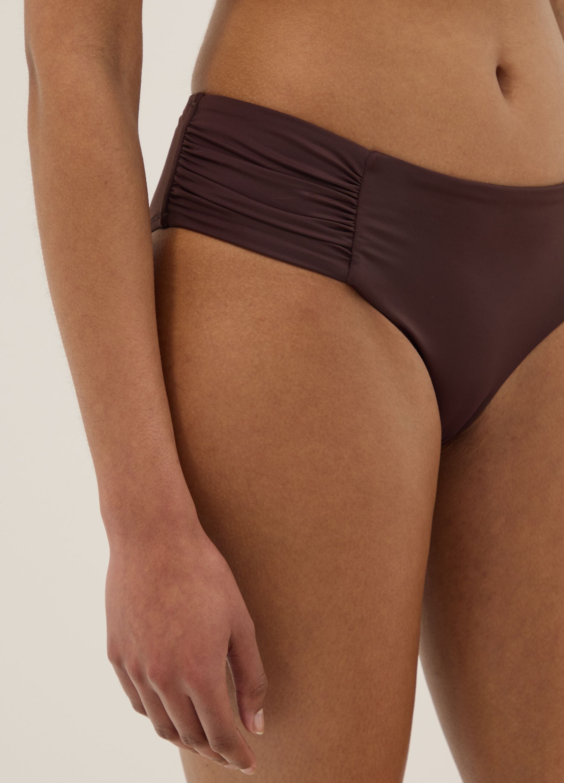 Brown stretch swim briefs with side ruching