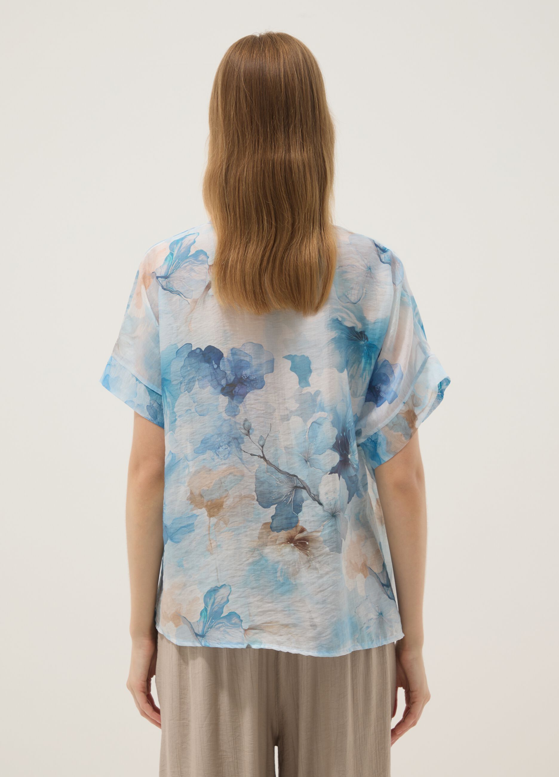 Light blue lyocell-blend shirt with floral print