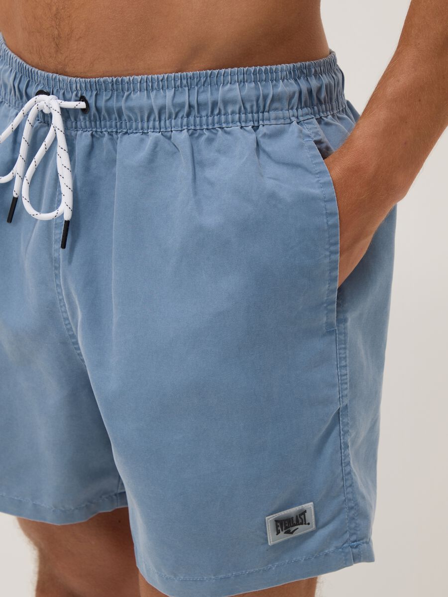 Blue swim shorts with drawstring waist_4