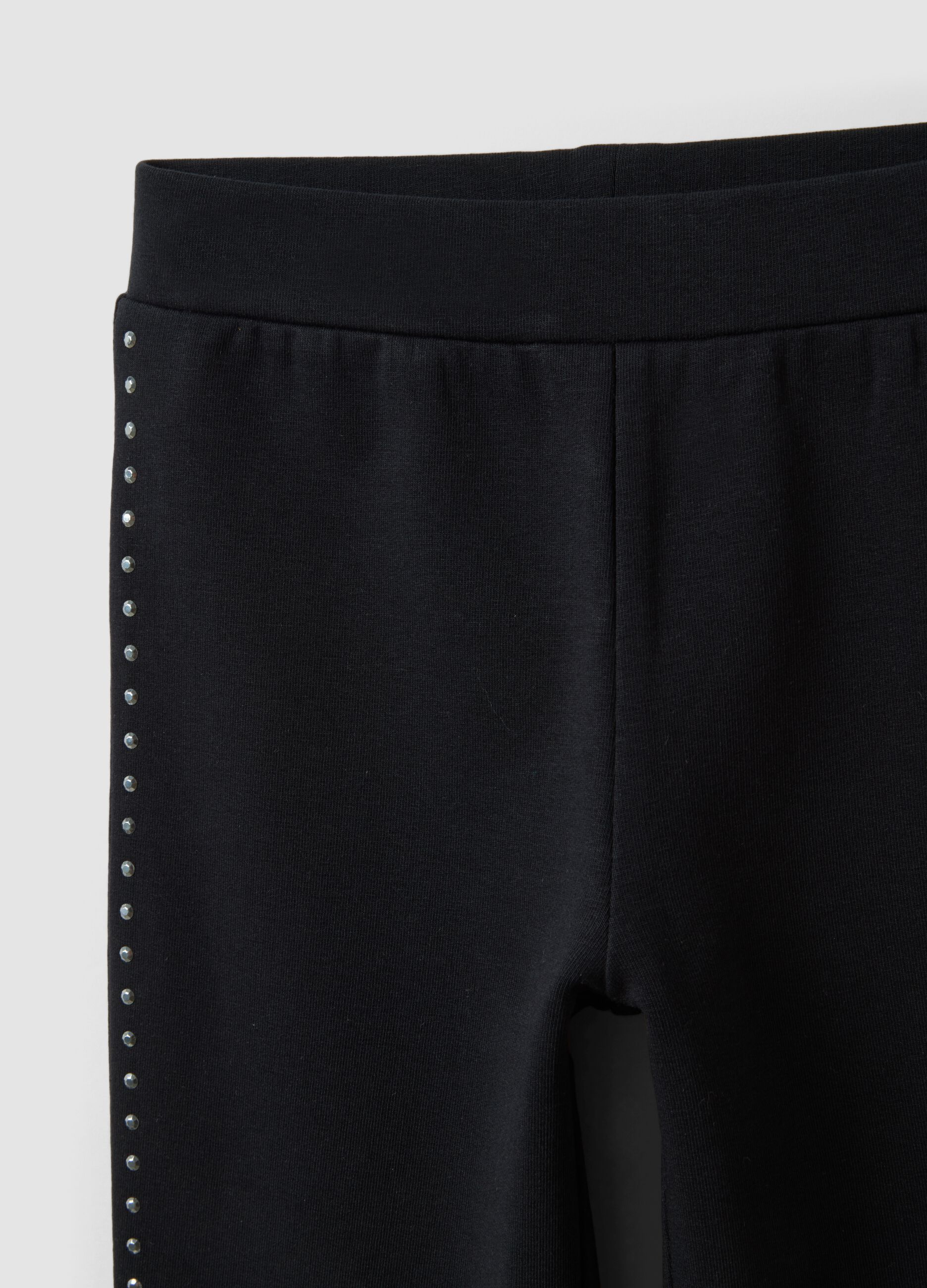 Black flared leggings in stretch cotton with studs