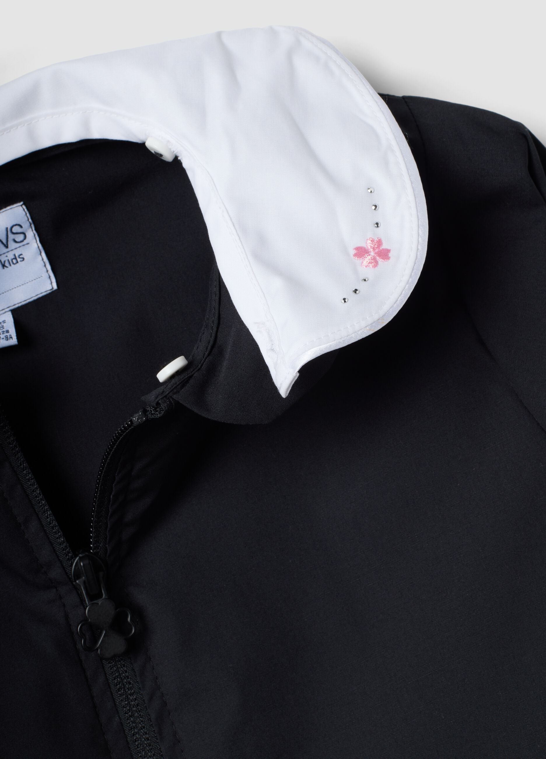 Customisable black school apron for girls with white collar