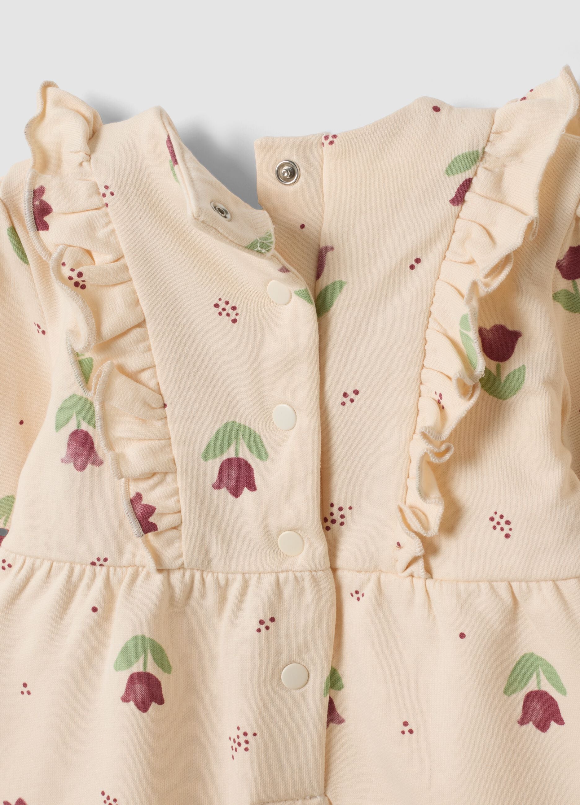 Beige organic cotton baby girl sleepsuit with floral print