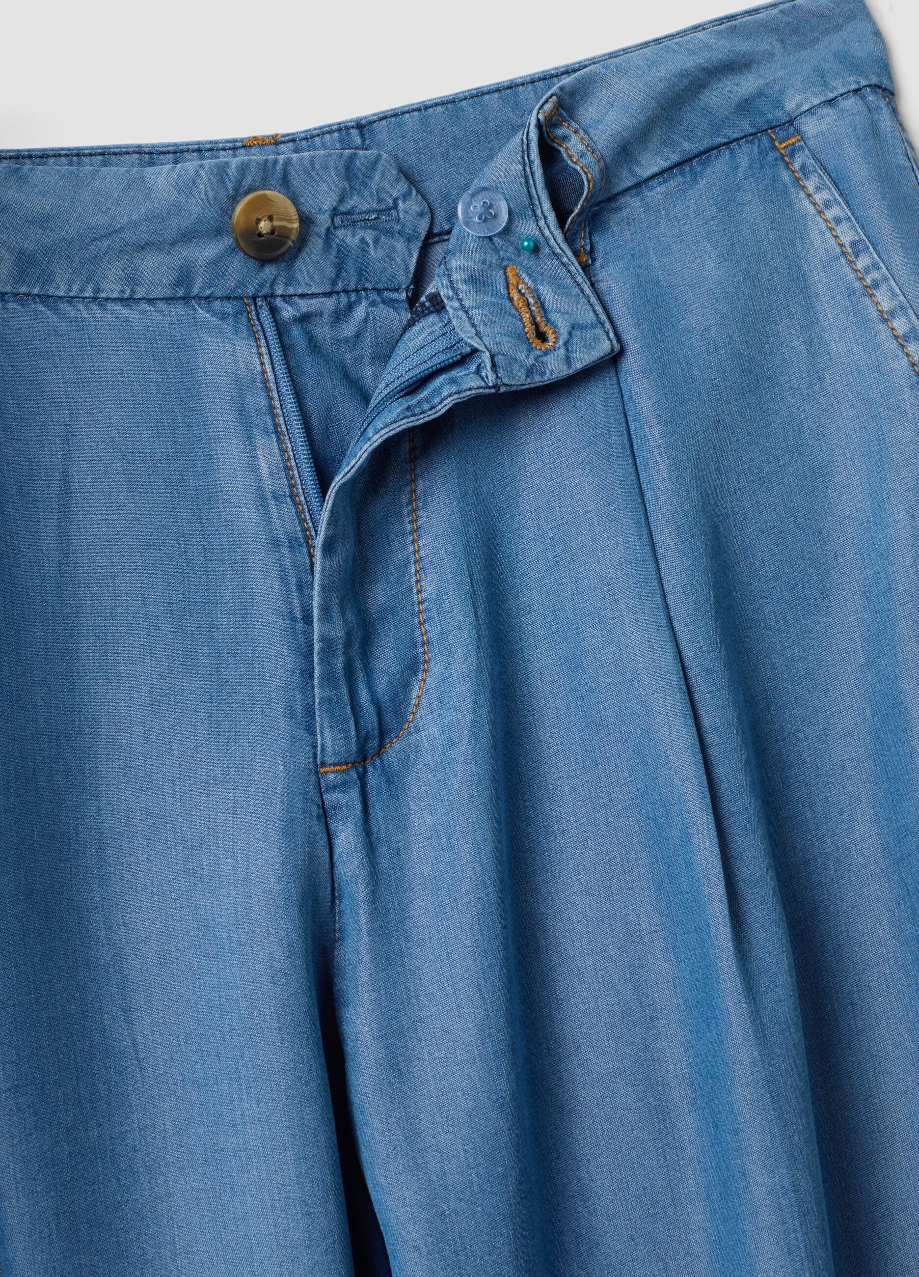 Light blue wide-leg denim trousers in pure lyocell