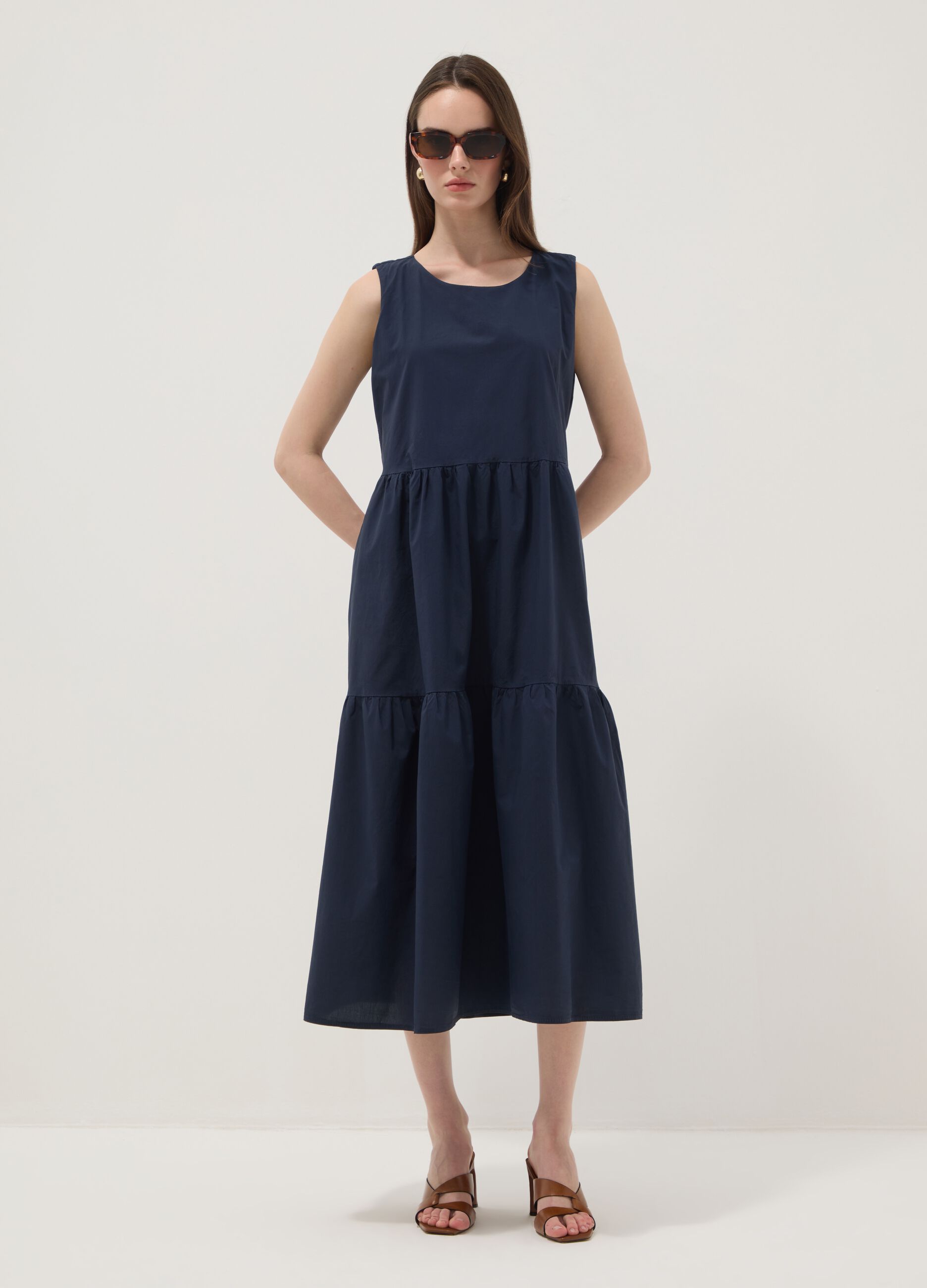 Blue sleeveless pure cotton dress with tiered skirt, regular fit