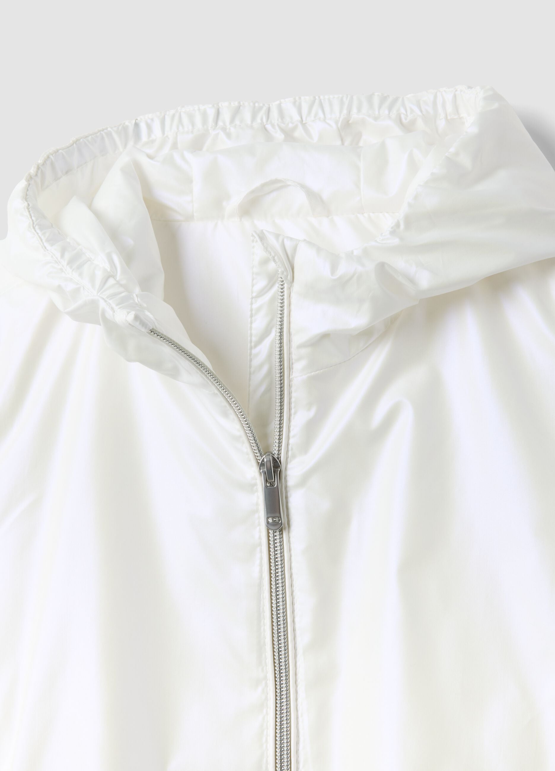 White hooded rain jacket with zip for girls