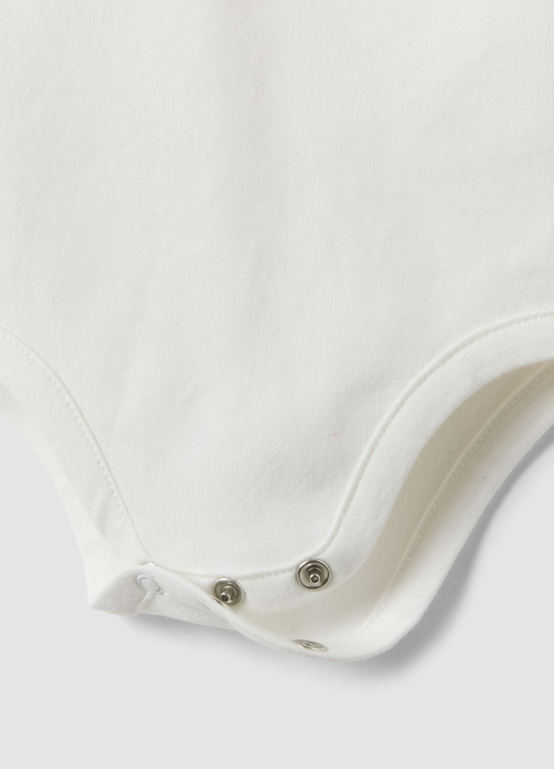 White organic cotton bodysuit with collar for baby girl