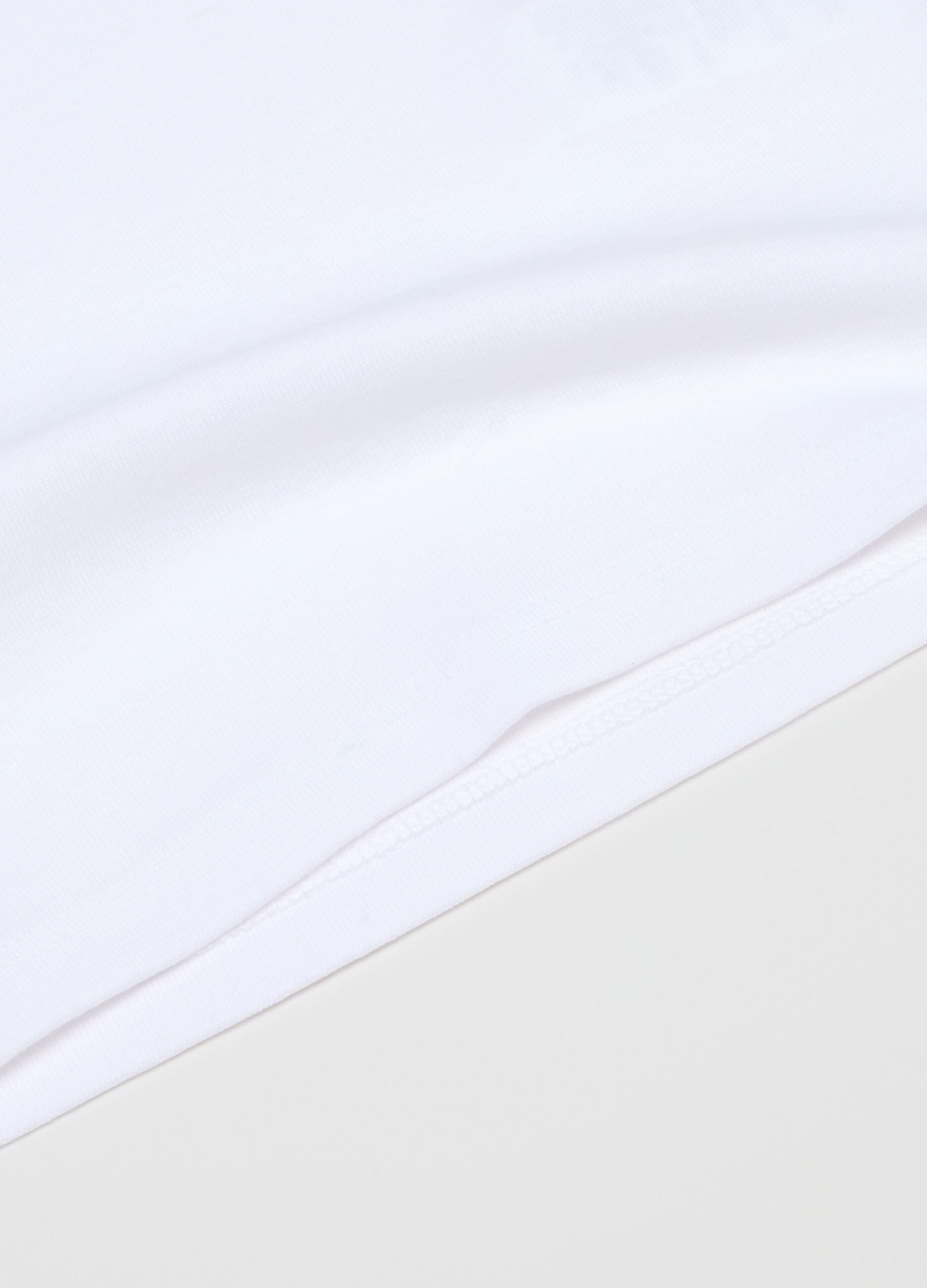 Twin pack of white girls' vests in pure cotton regular fit