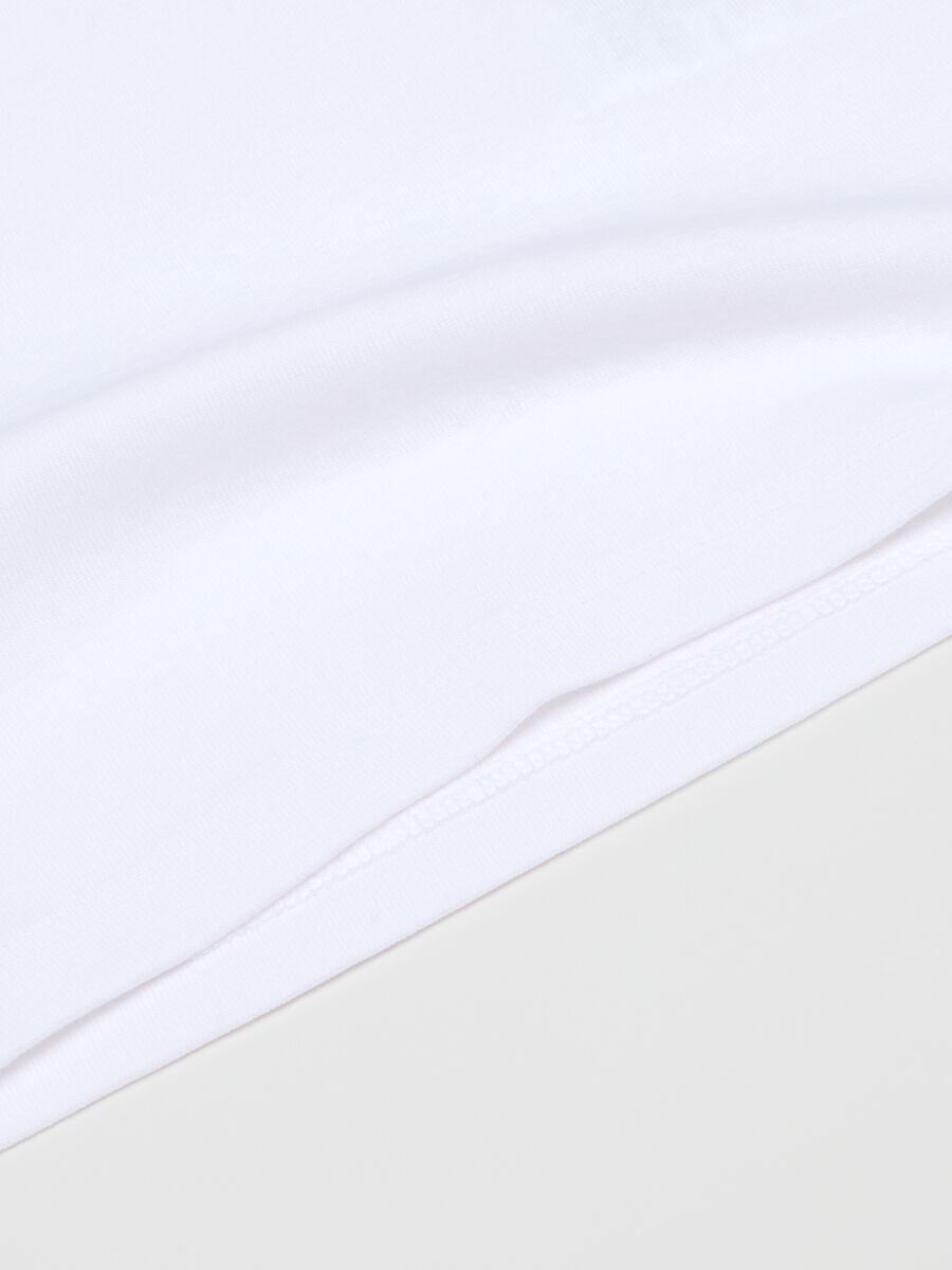 Twin pack of white girls' vests in pure cotton regular fit_3