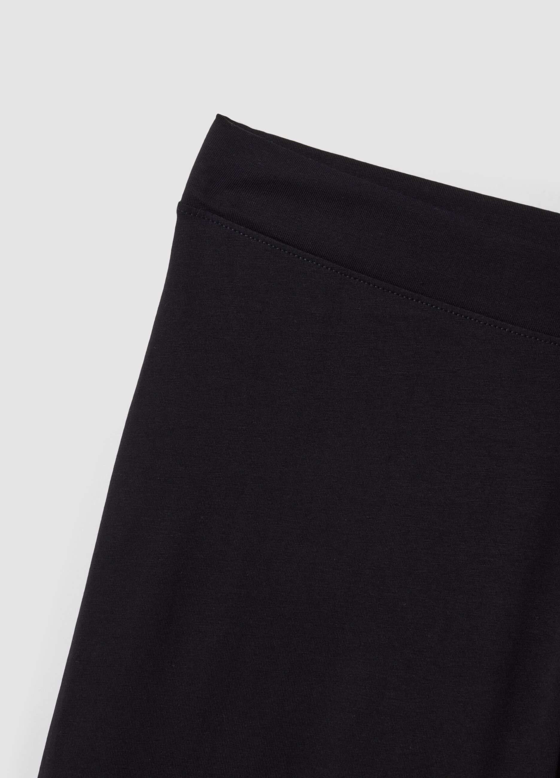 Black flared leggings in stretch cotton