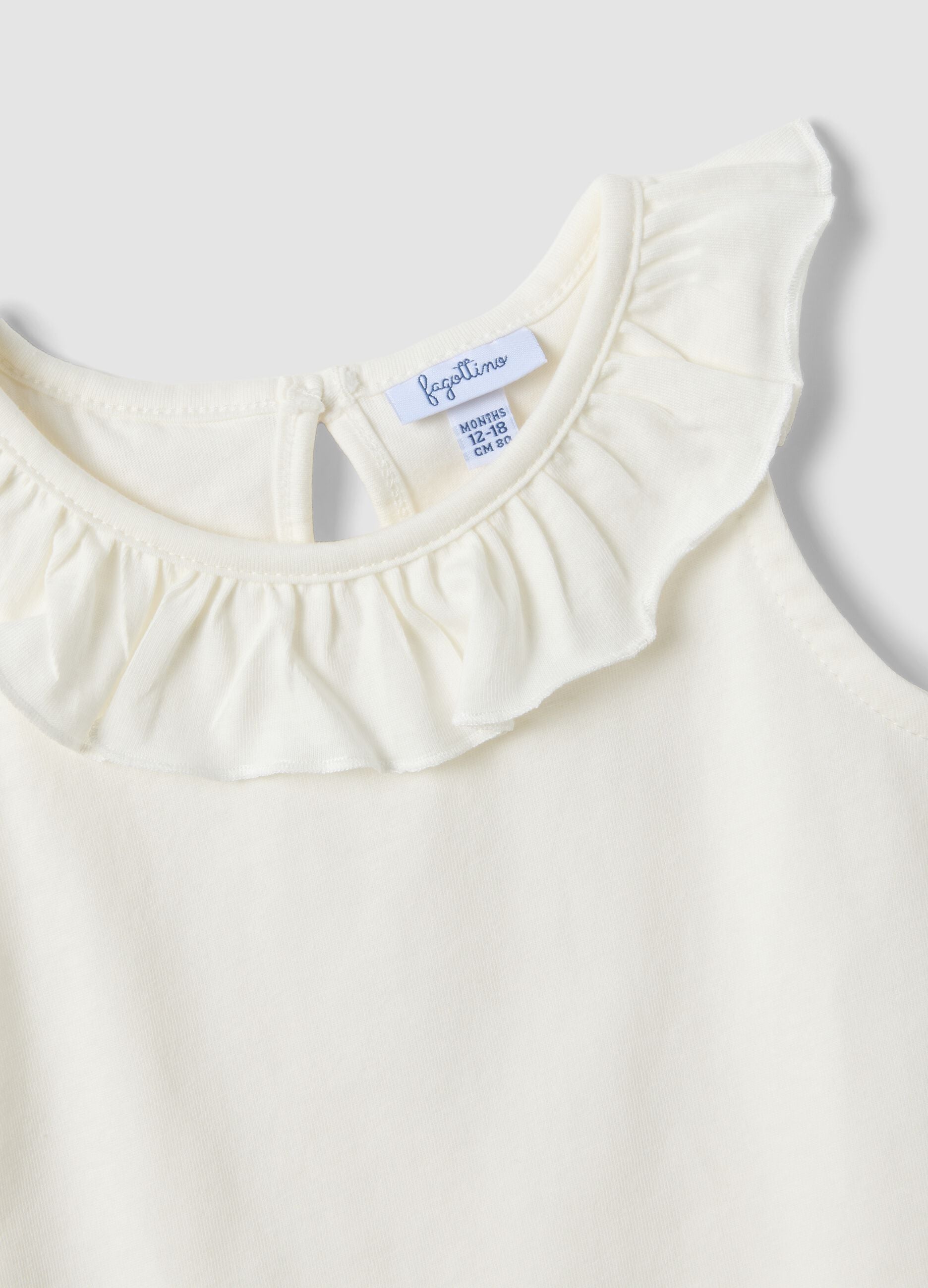 White organic cotton tank top with ruffle trim