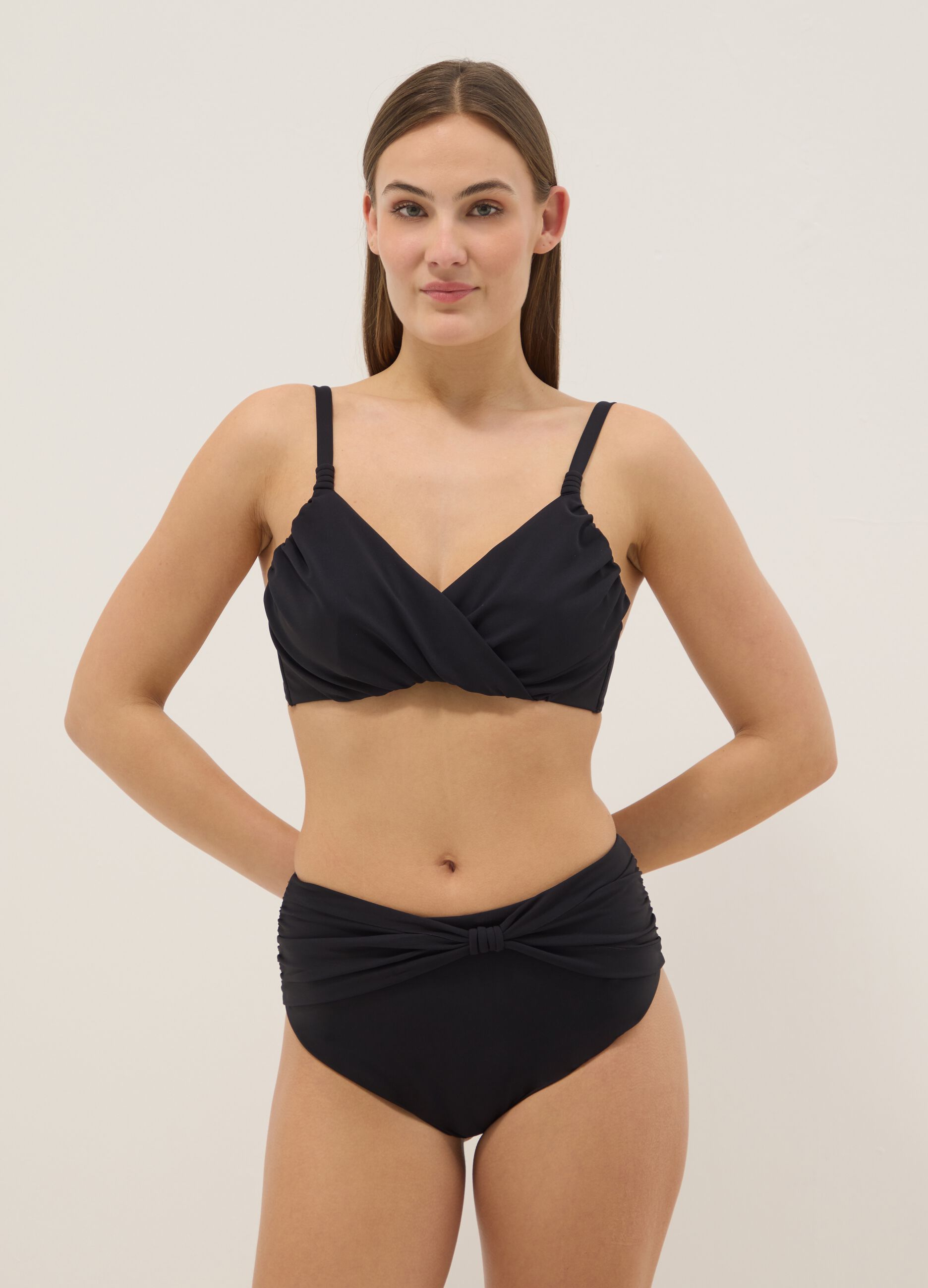 Black bikini top in stretch fabric with shaping effect
