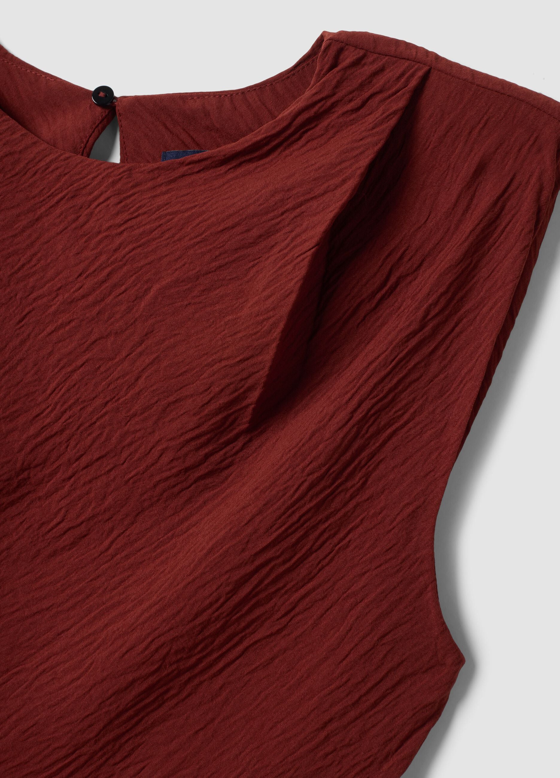 Red fitted dress with ruched detailing