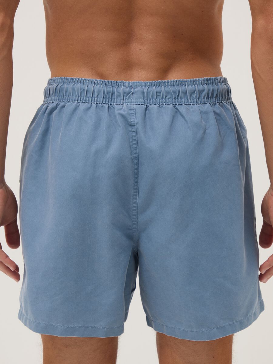 Blue swim shorts with drawstring waist_3