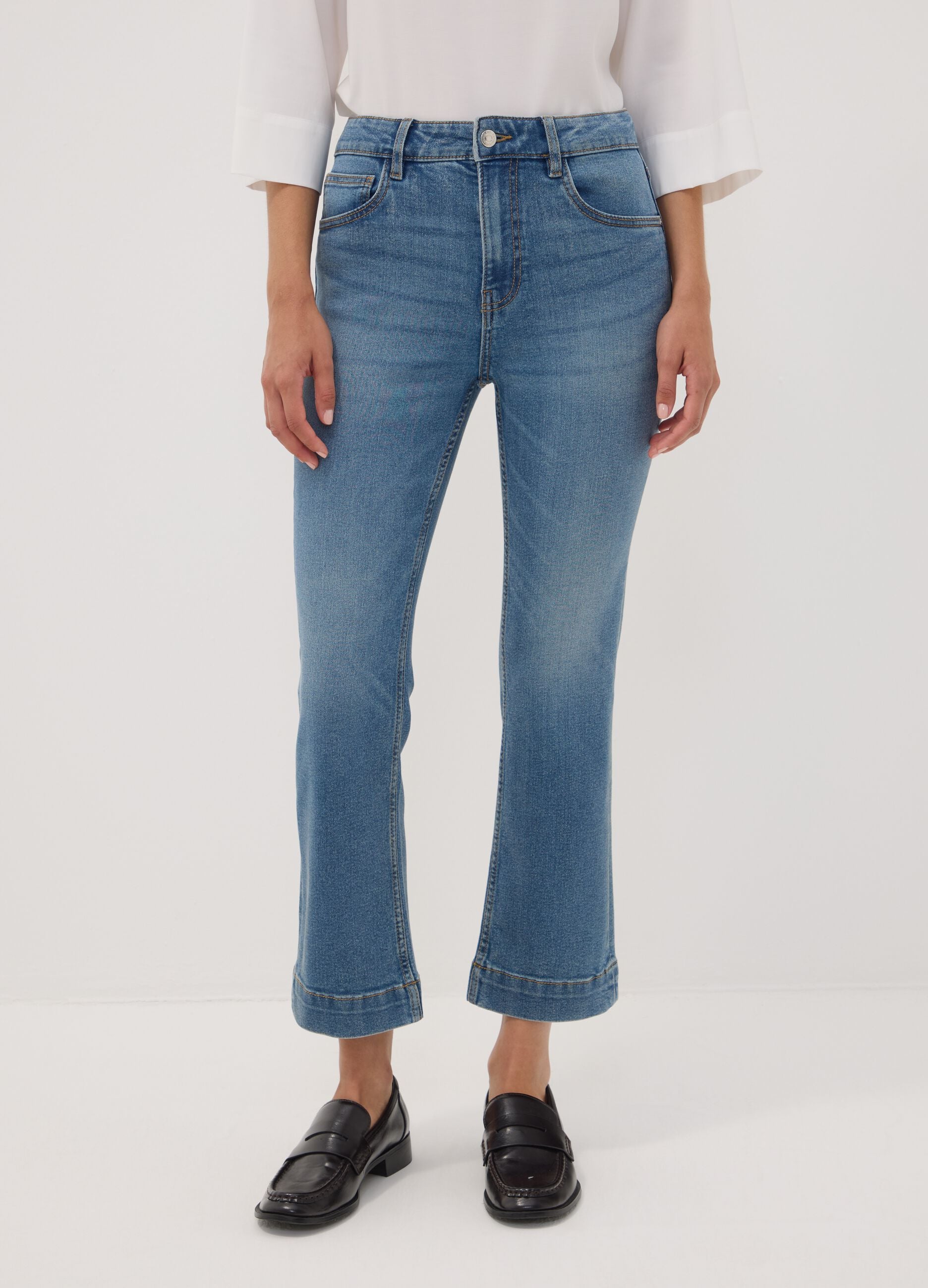 Light blue cropped slim-fit stretch denim jeans in cotton and viscose