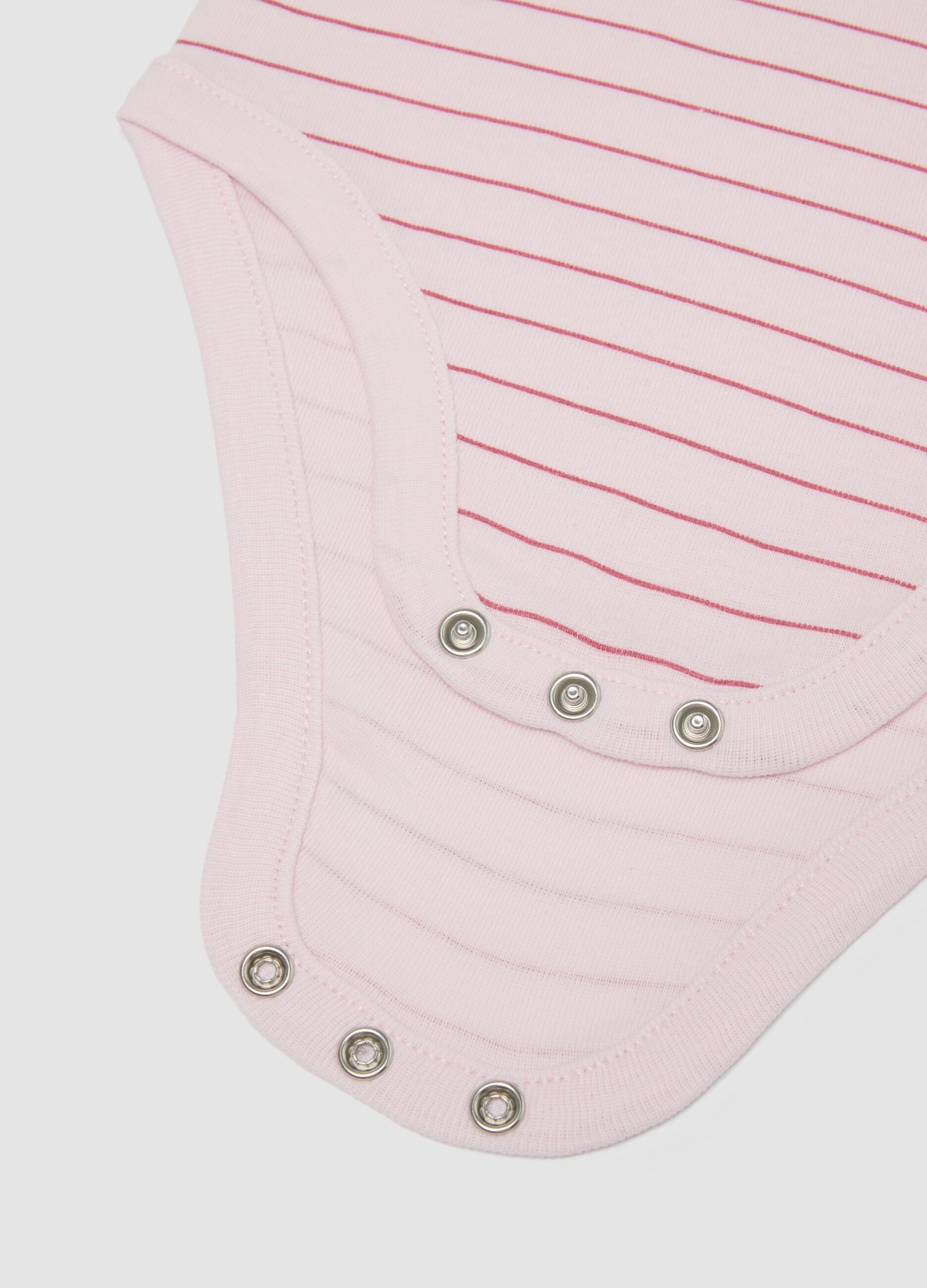 2-pack of pink organic cotton bodysuits for baby girls