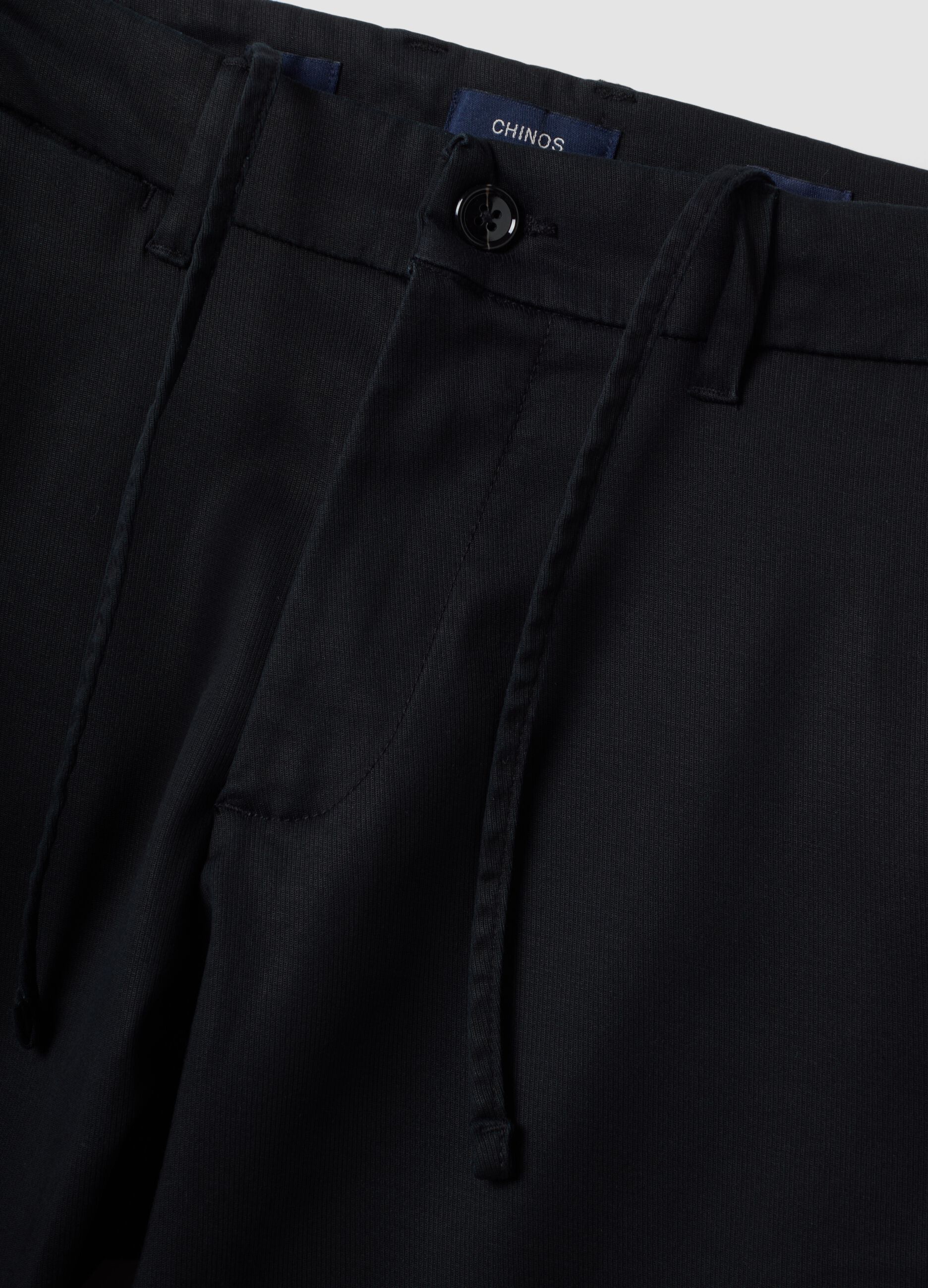 Black slim-fit chino trousers in lyocell and stretch cotton
