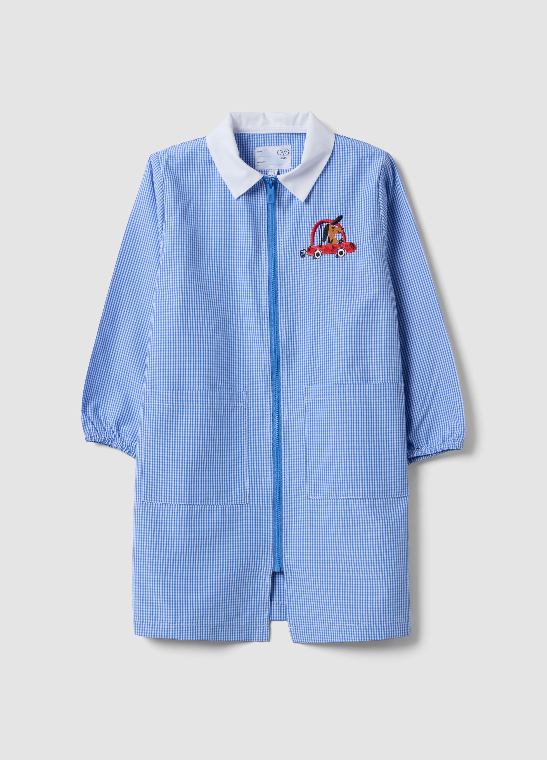 Customisable blue gingham nursery apron with machine embroidery