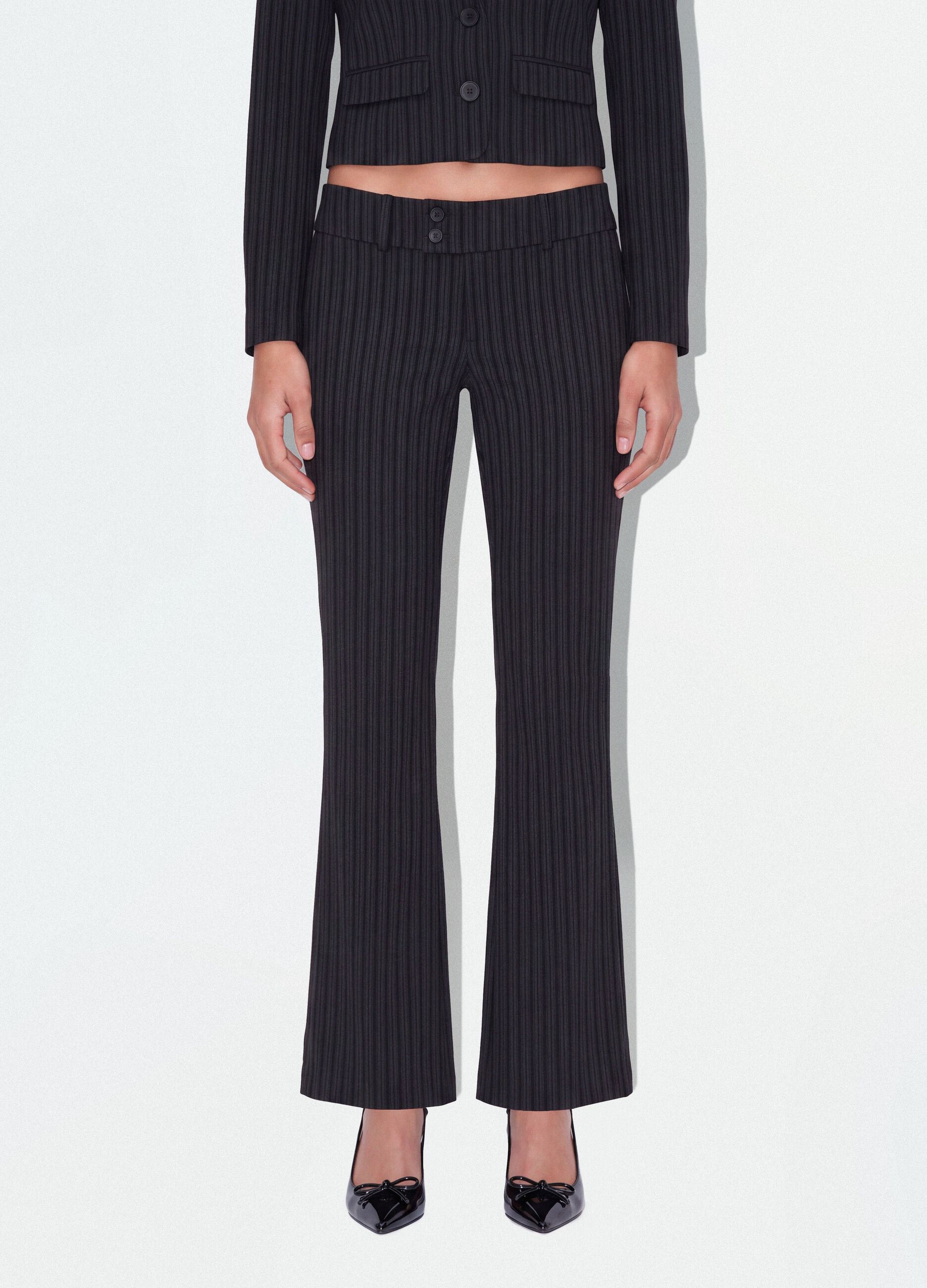 Black flared pinstripe trousers in stretch viscose