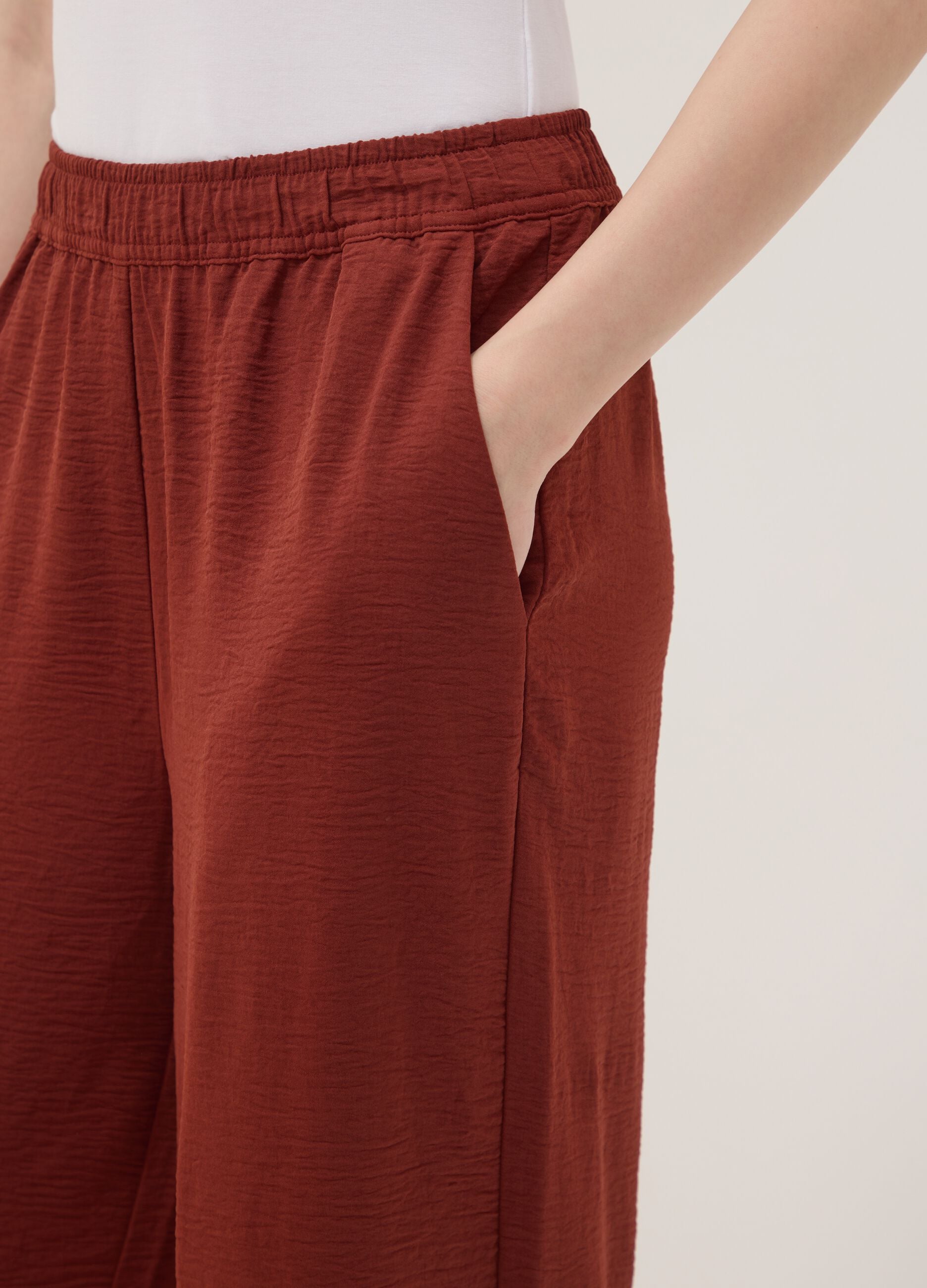 Red wide-leg trousers with elasticated waistband