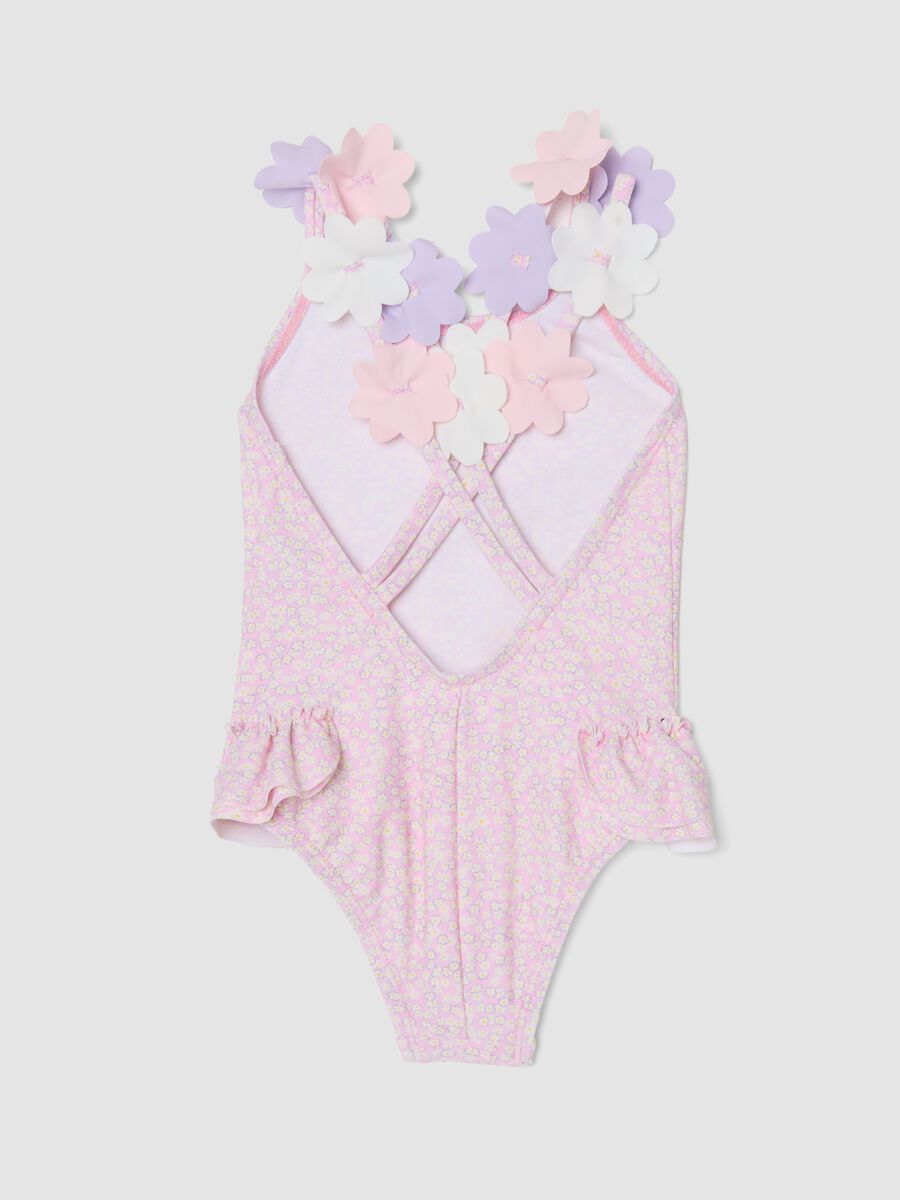 Costume intero rosa in tessuto elasticizzato con fiori applicati per bimba_1