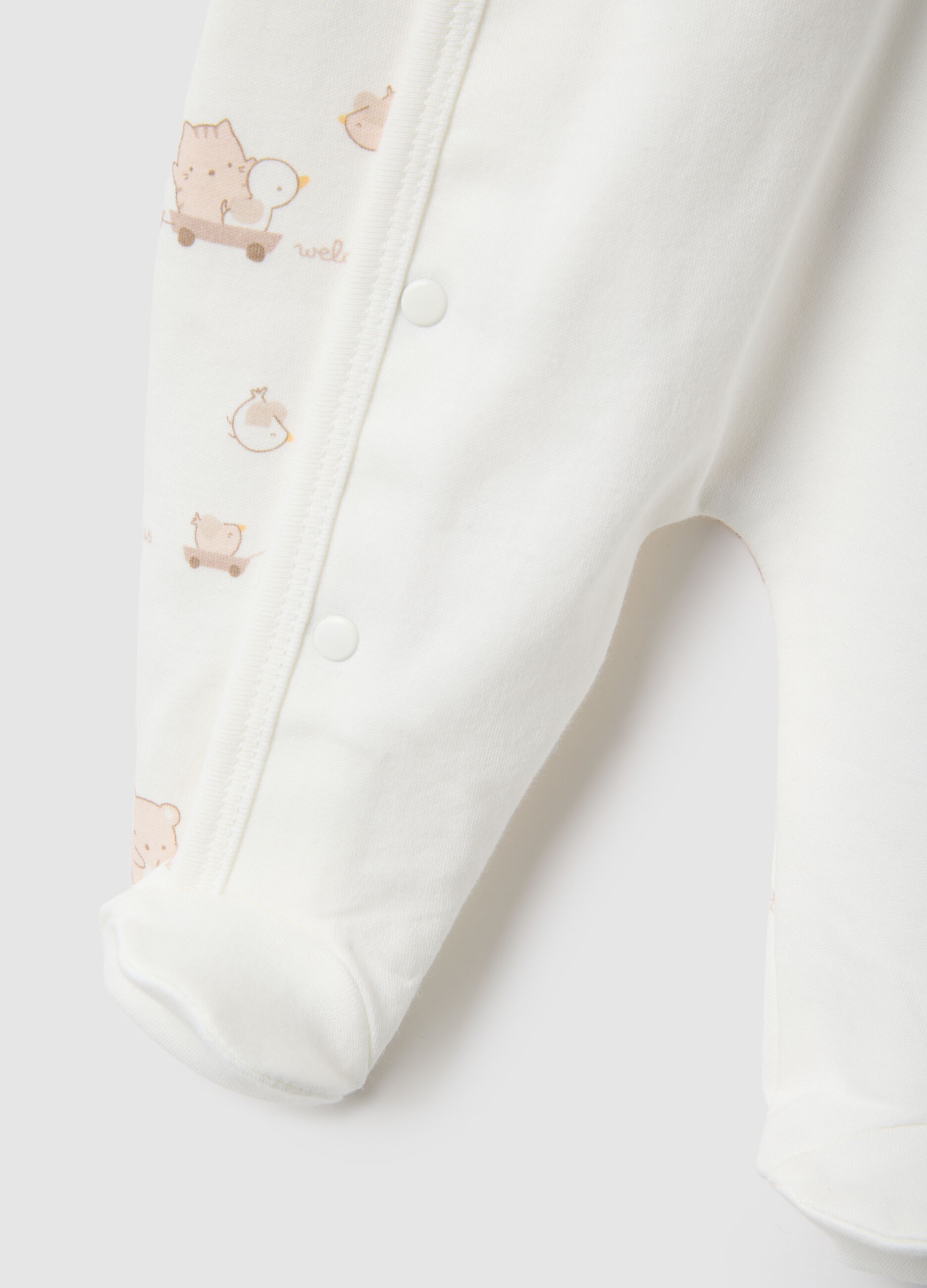 White newborn romper in pure cotton with long sleeves and embroidery