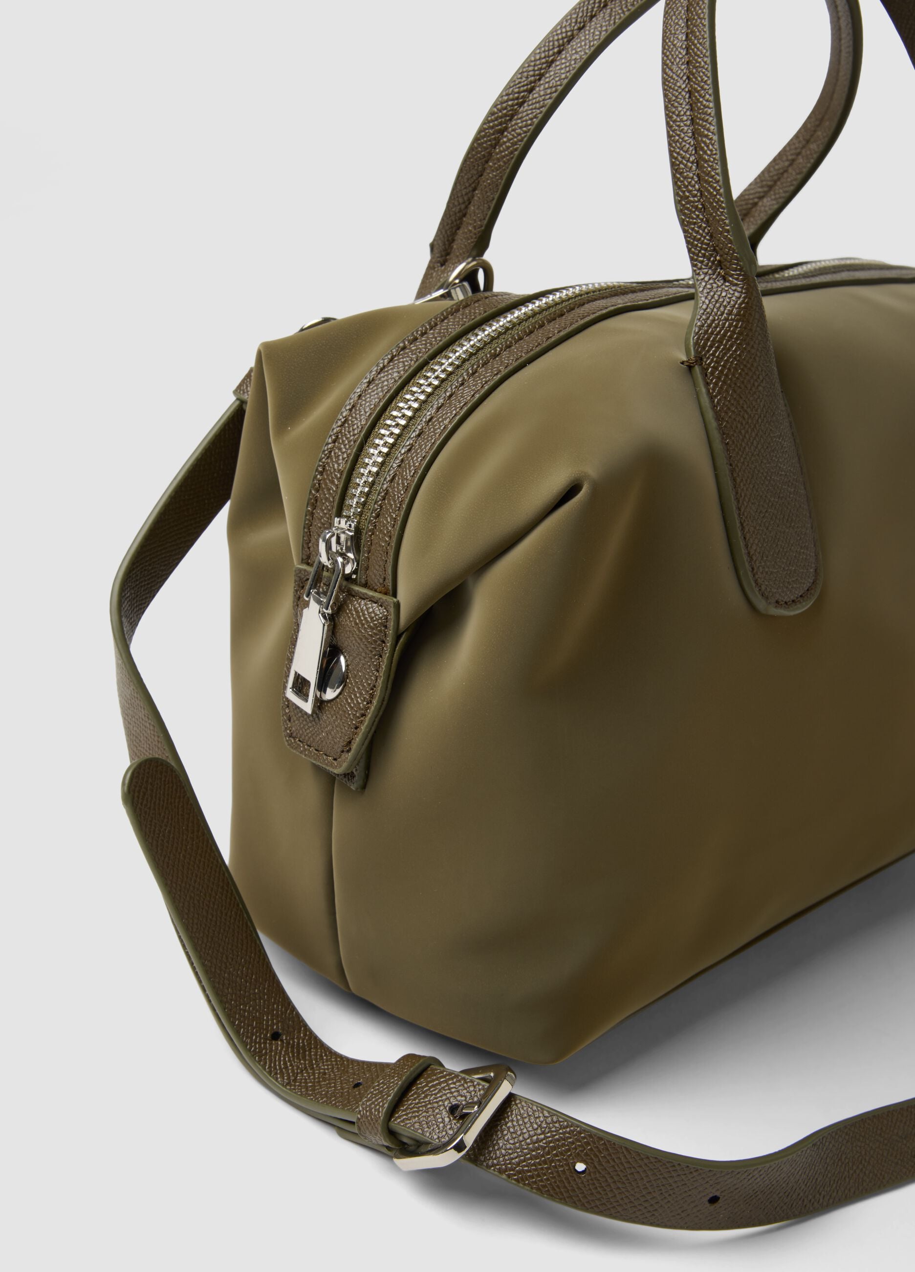 Green handbag with adjustable shoulder strap