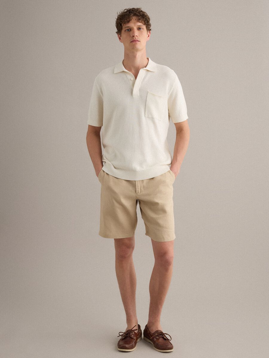 Polo bianca in puro cotone con taschino regular fit_1