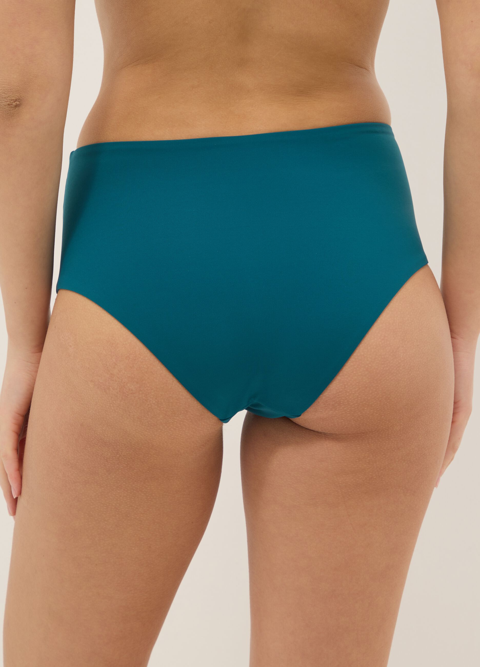 Green high-waisted stretch bikini bottoms with shaping effect