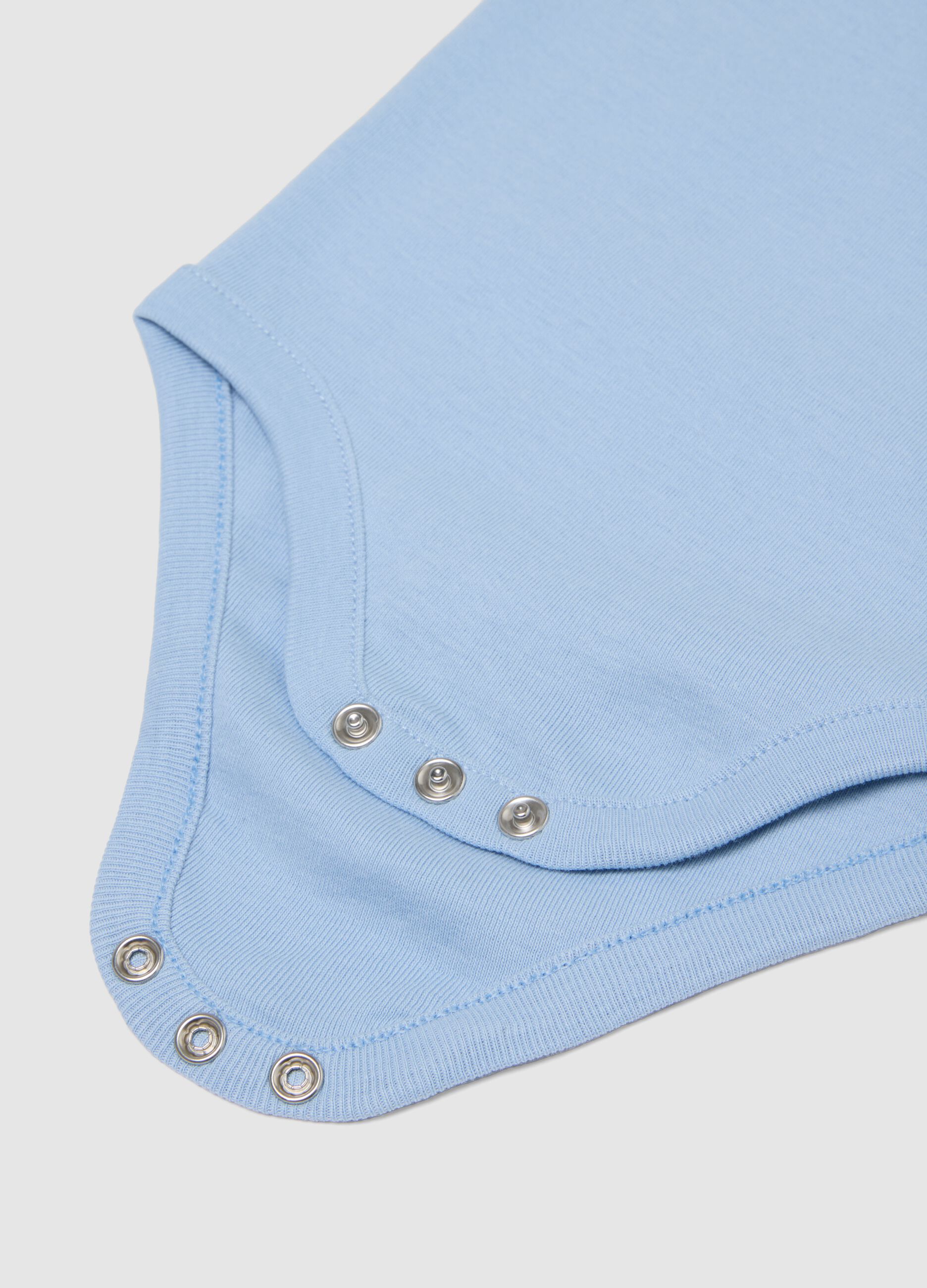 Multicoloured sleeveless bodysuit tripack in pure cotton for newborns