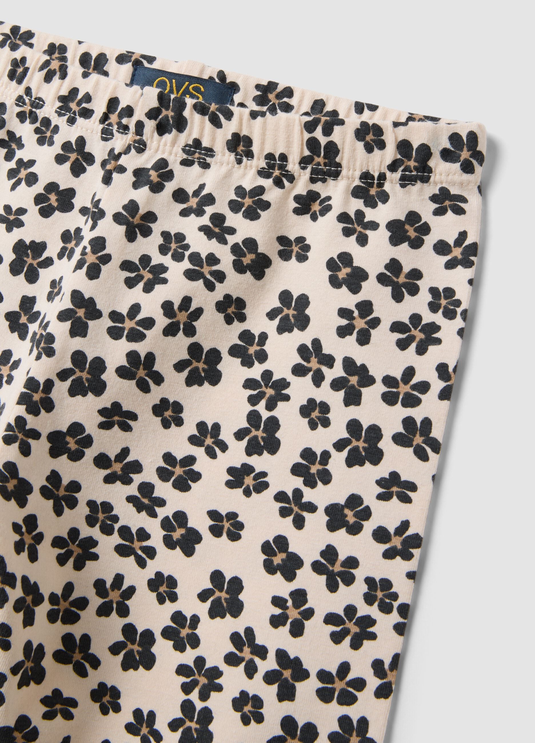 Beige organic cotton shorts with floral print
