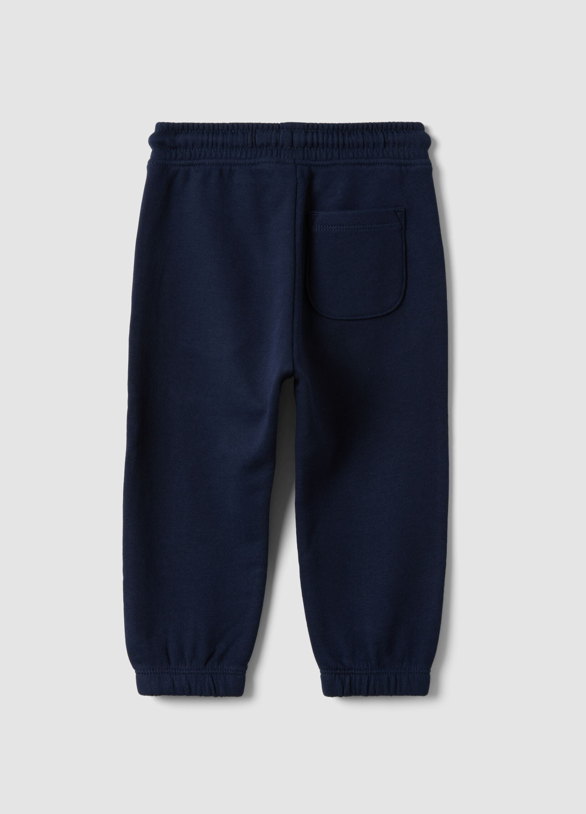 Blue jogger trousers in pure organic cotton with drawstring for baby boy