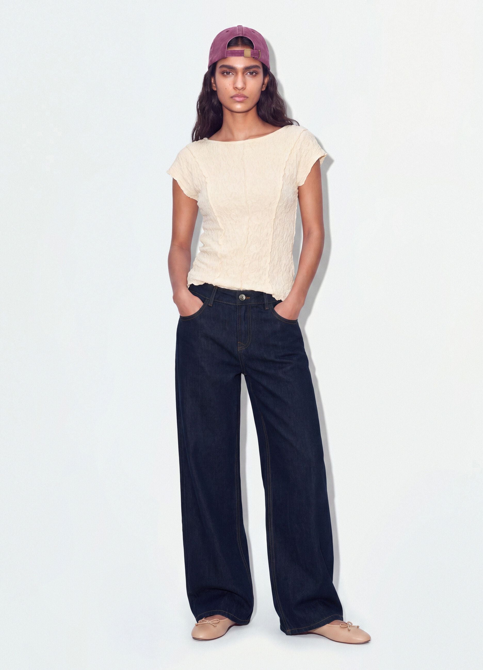 White stretch T-shirt with raised floral texture