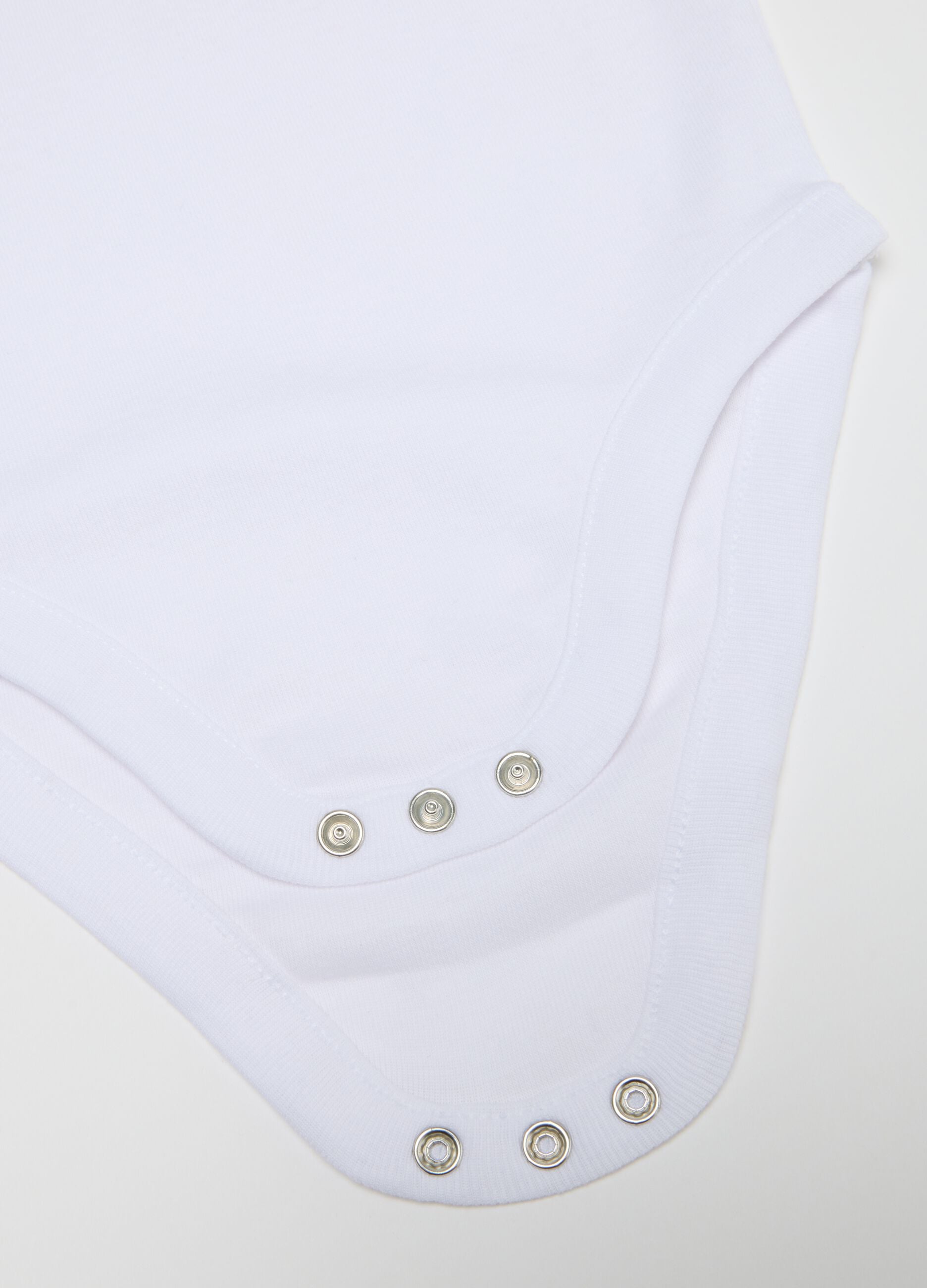 White newborn cotton bodysuit tripack