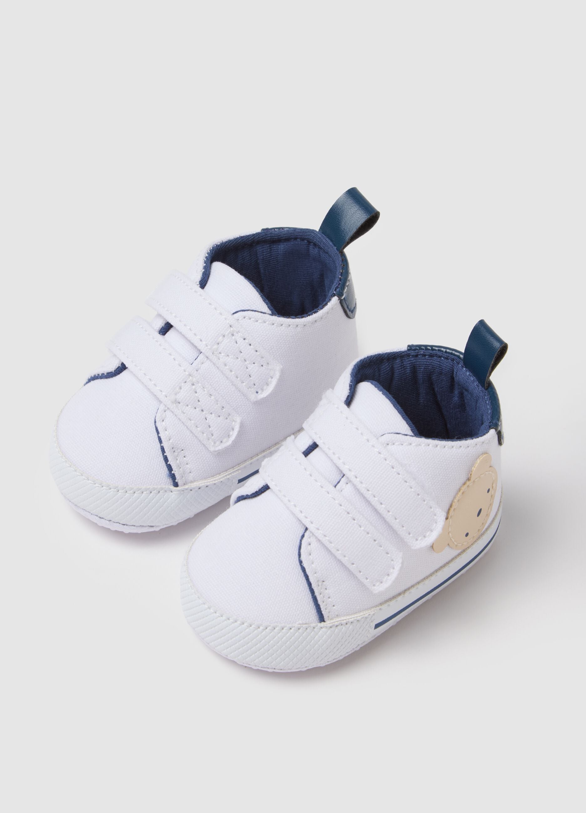White canvas baby shoes