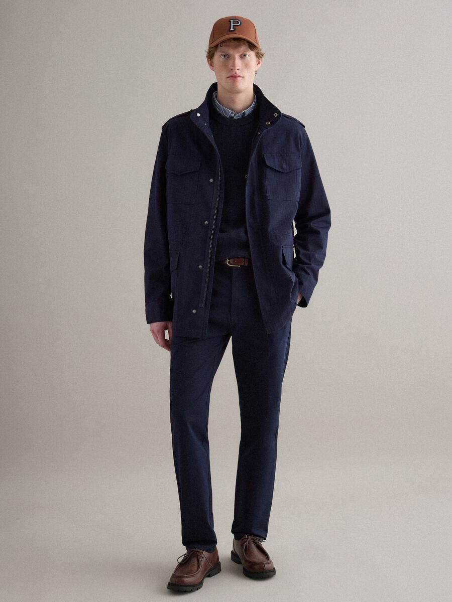 Pantaloni chino blu in cotone elasticizzato slim fit_1