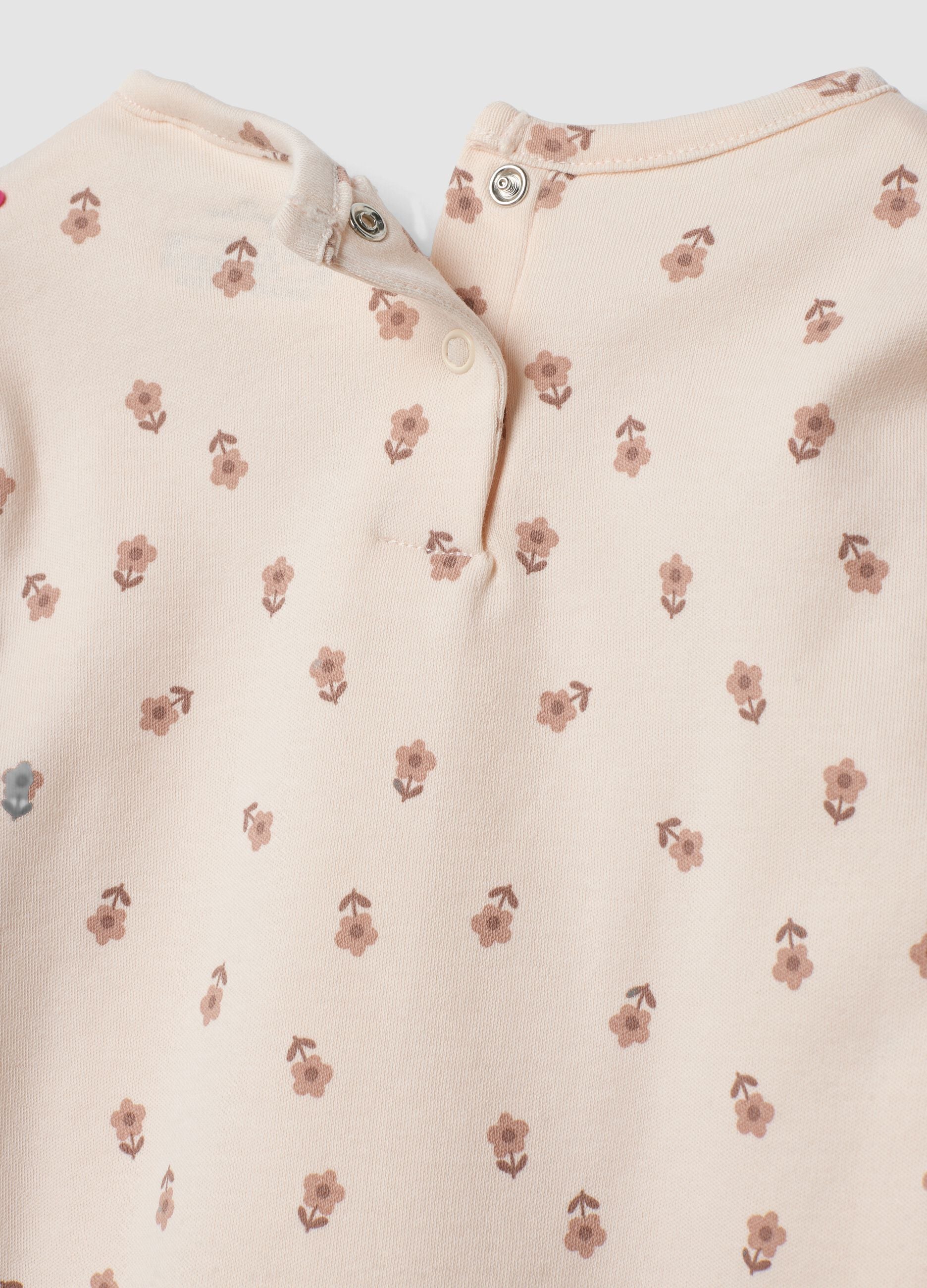 Pink organic cotton floral-print pyjamas for baby girl and toddler