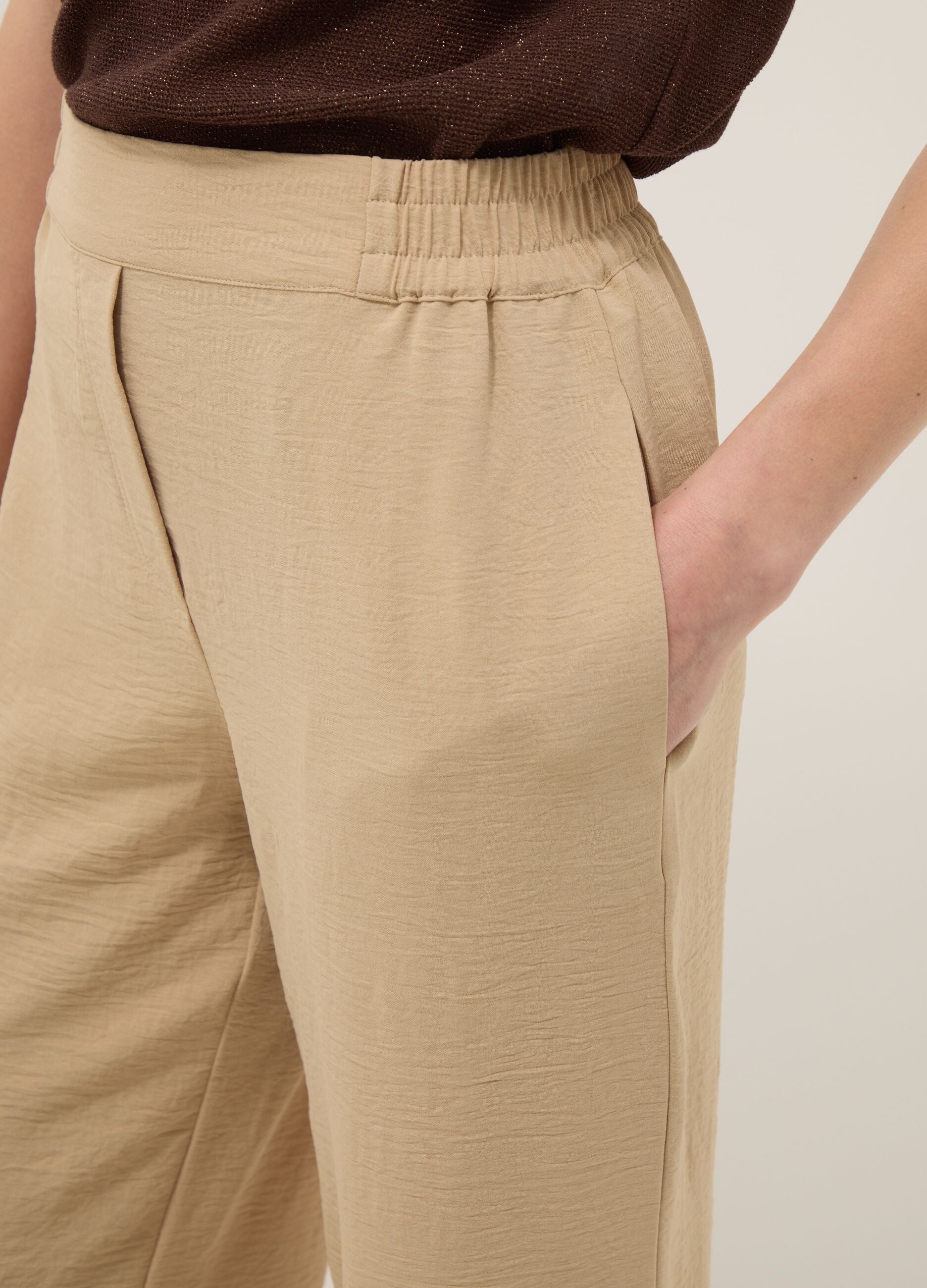 Beige wide-leg trousers with elasticated waist